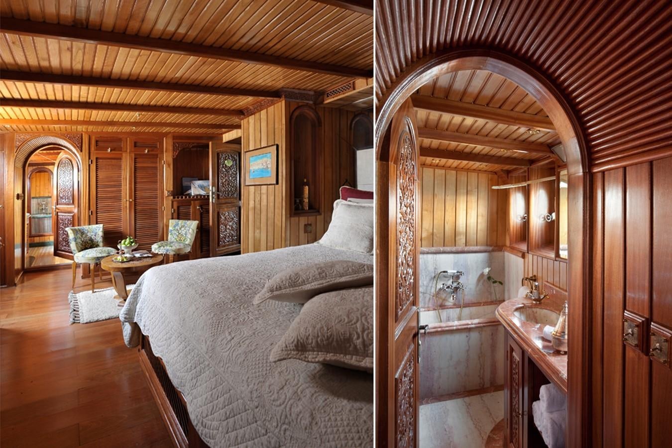a bedroom with a bed and a table aboard NORTH SEA Yacht for Sale