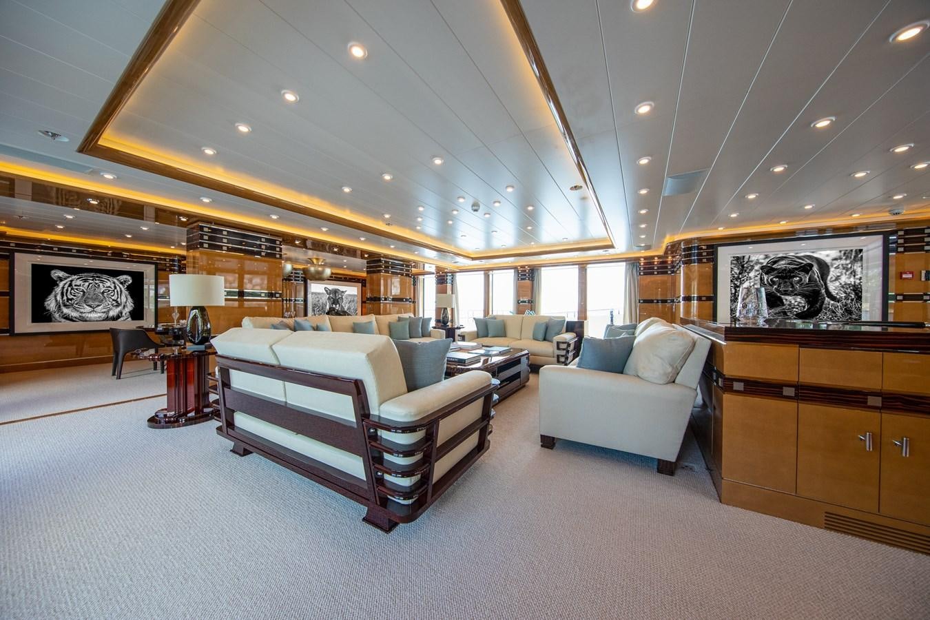 a large living room with a large open floor plan aboard AHS Yacht for Sale