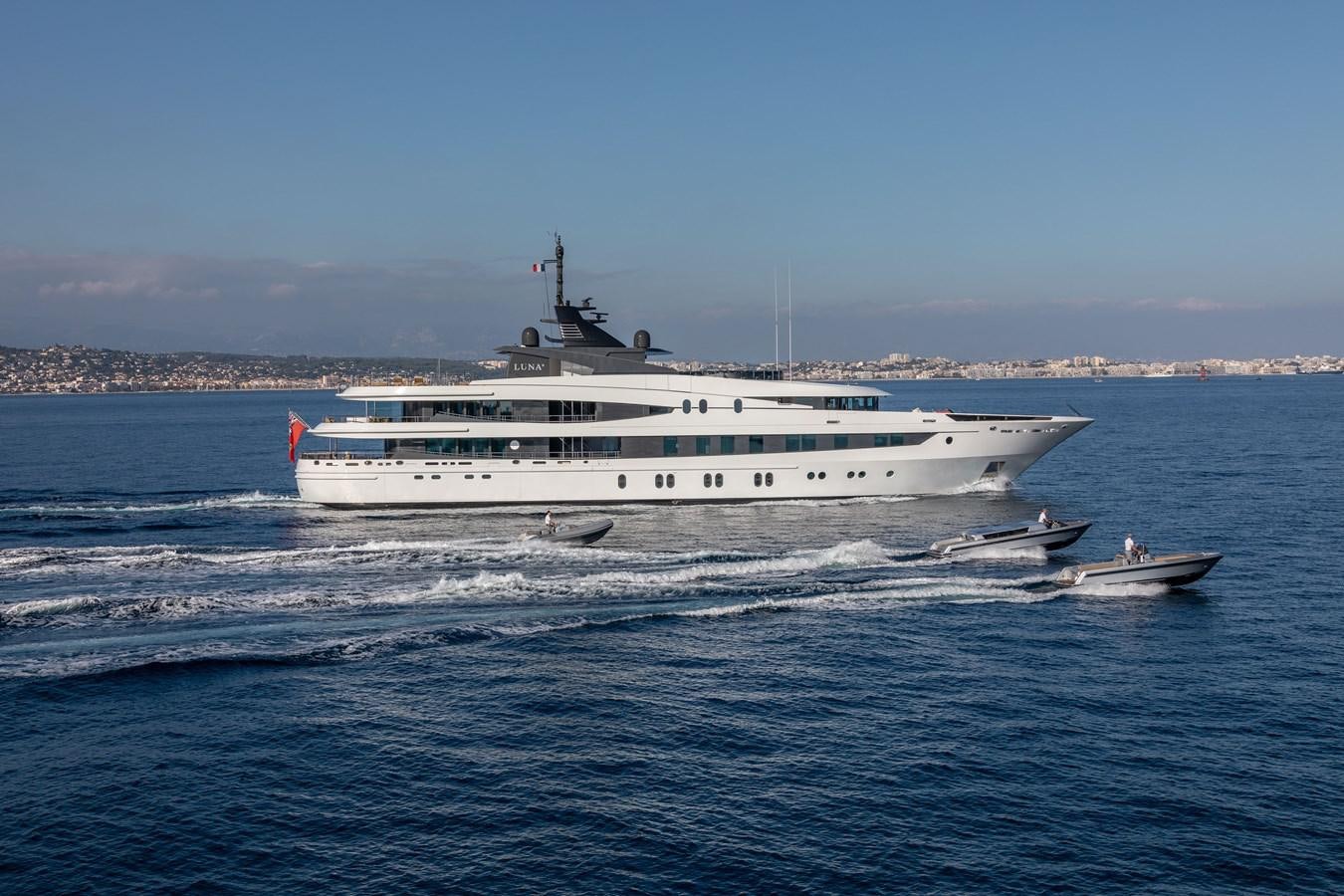a large white boat on the water aboard AHS Yacht for Sale