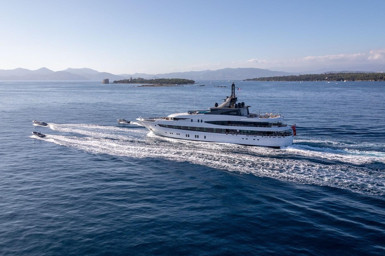 a large white boat on the water aboard AHS Yacht for Sale