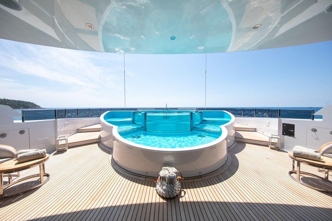 a large indoor swimming pool aboard AHS Yacht for Sale