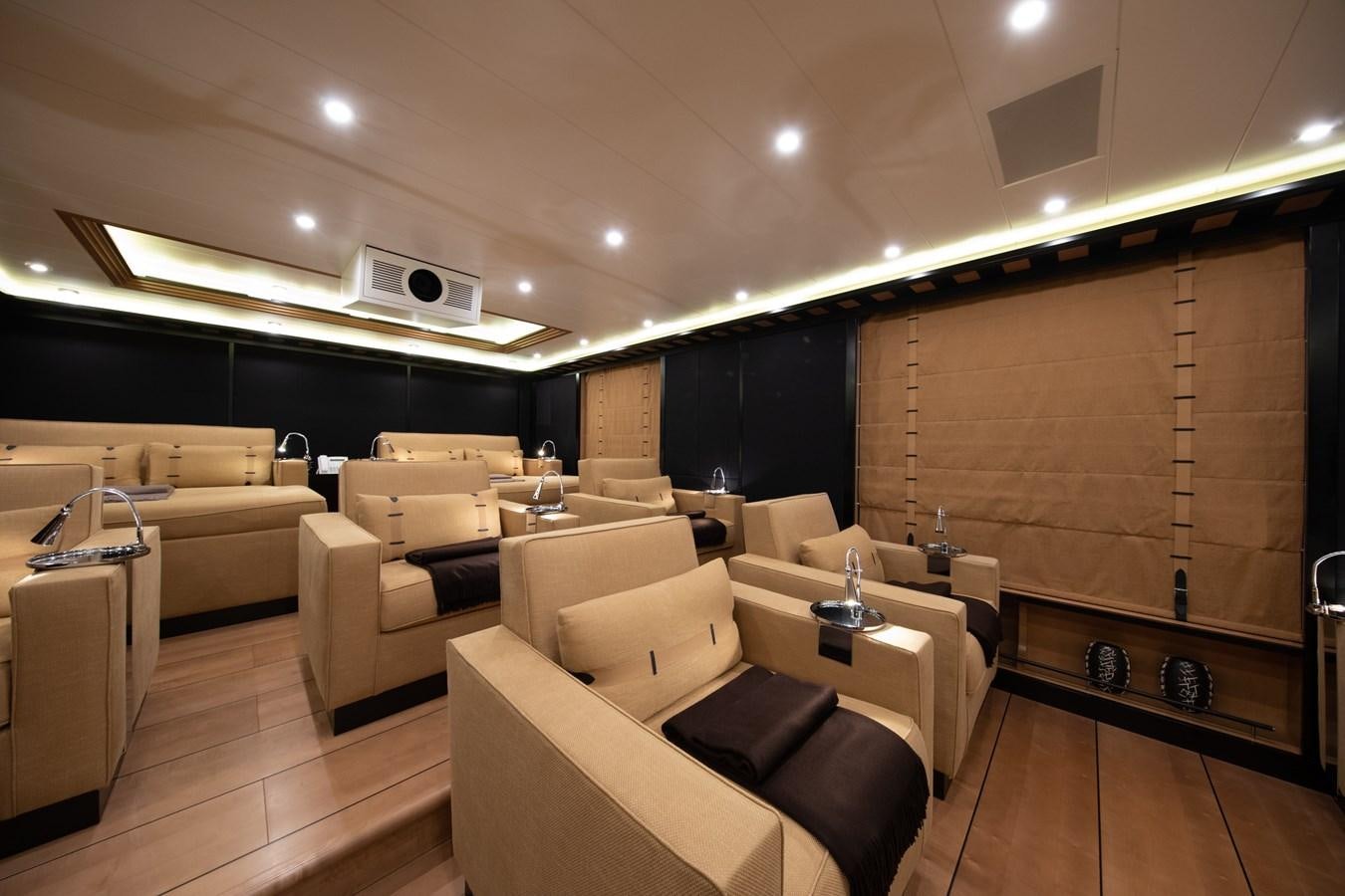 a room with couches and a television aboard AHS Yacht for Sale