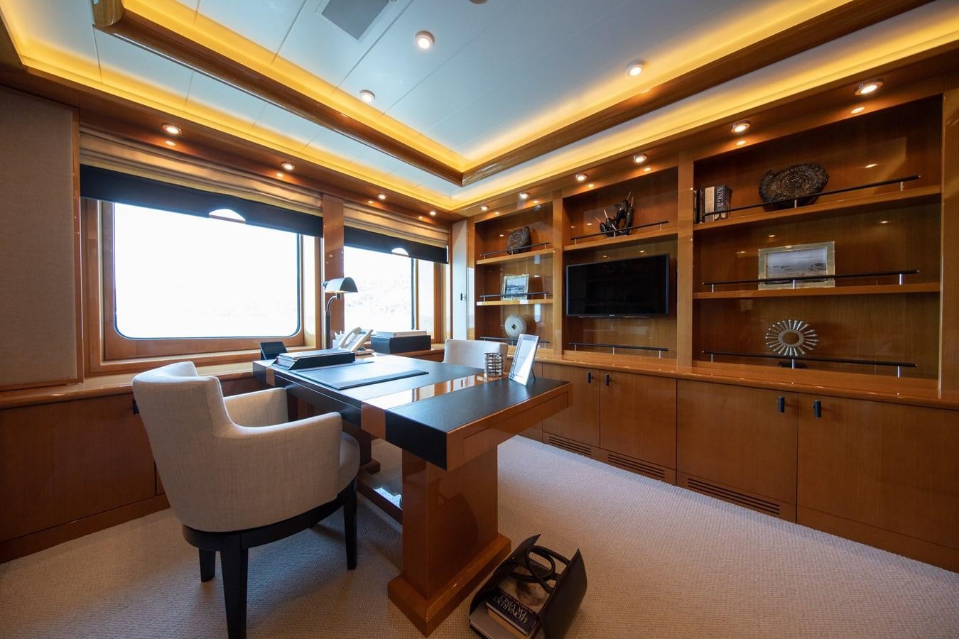 a room with a desk and a chair aboard AHS Yacht for Sale