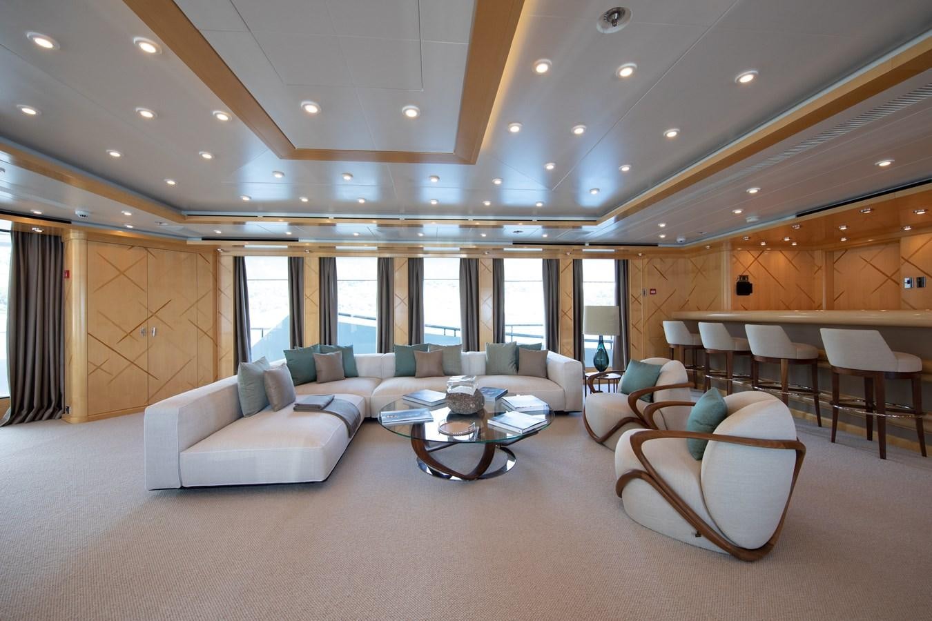 a large living room with a large open floor plan aboard AHS Yacht for Sale