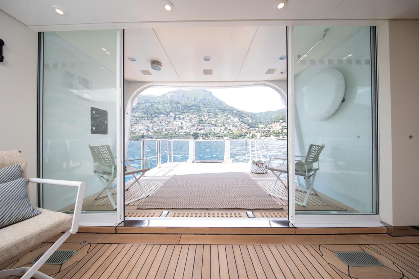 a room with a large window aboard AHS Yacht for Sale