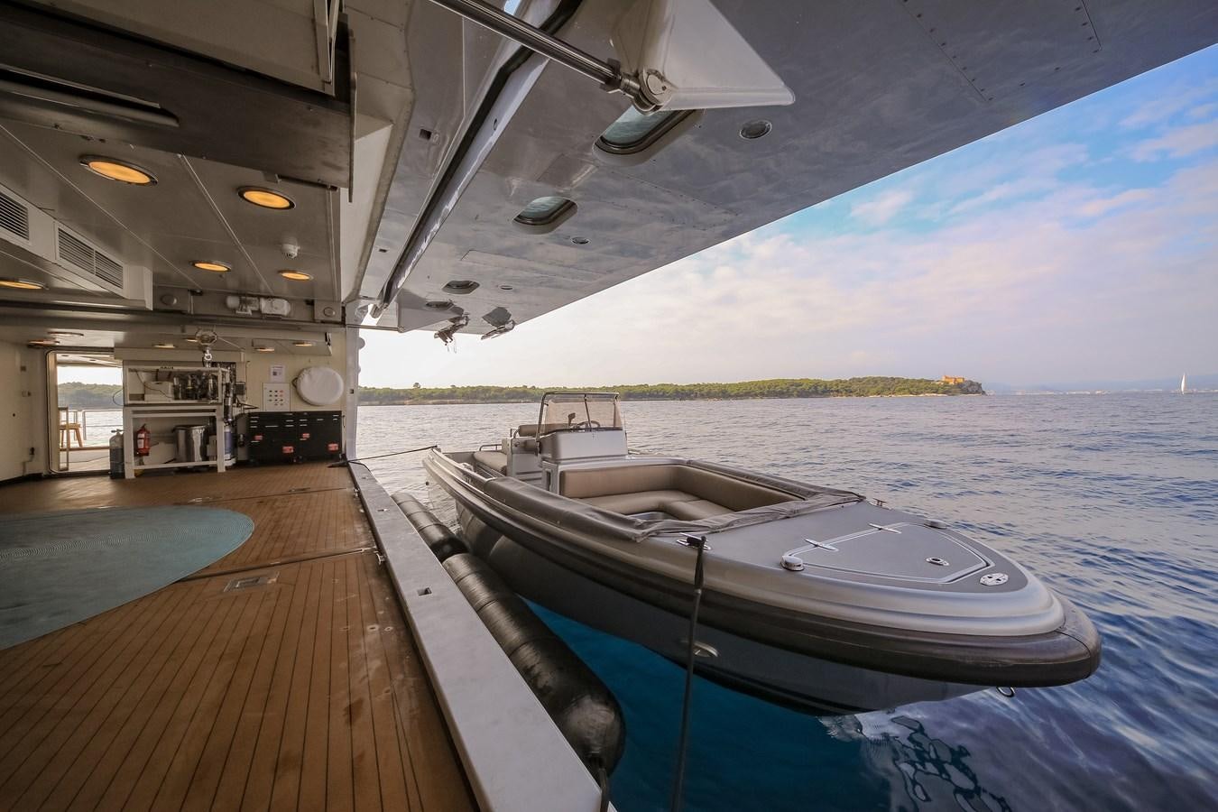 a boat on a deck aboard AHS Yacht for Sale