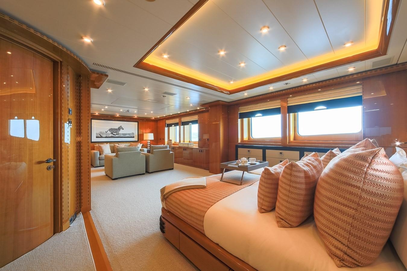 a room with a bed and a couch aboard AHS Yacht for Sale