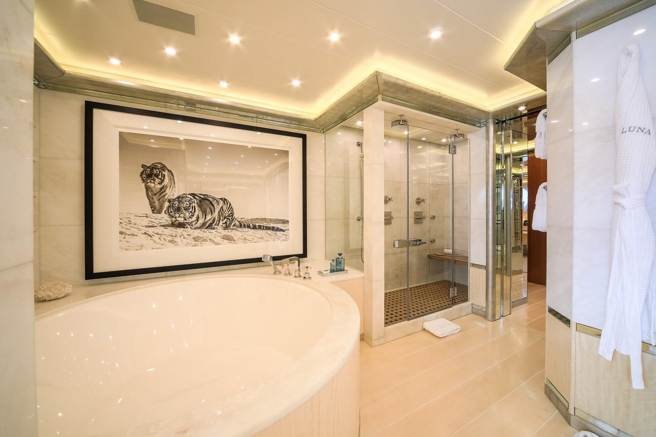 a large bathroom with a large bathtub aboard AHS Yacht for Sale