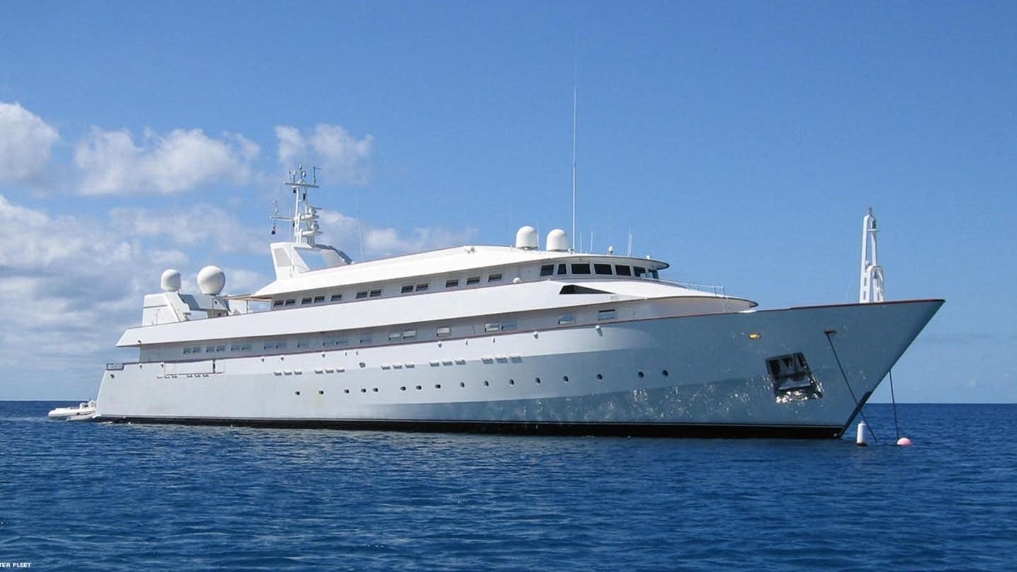 a large white ship in the water aboard ADAMAS V Yacht for Sale