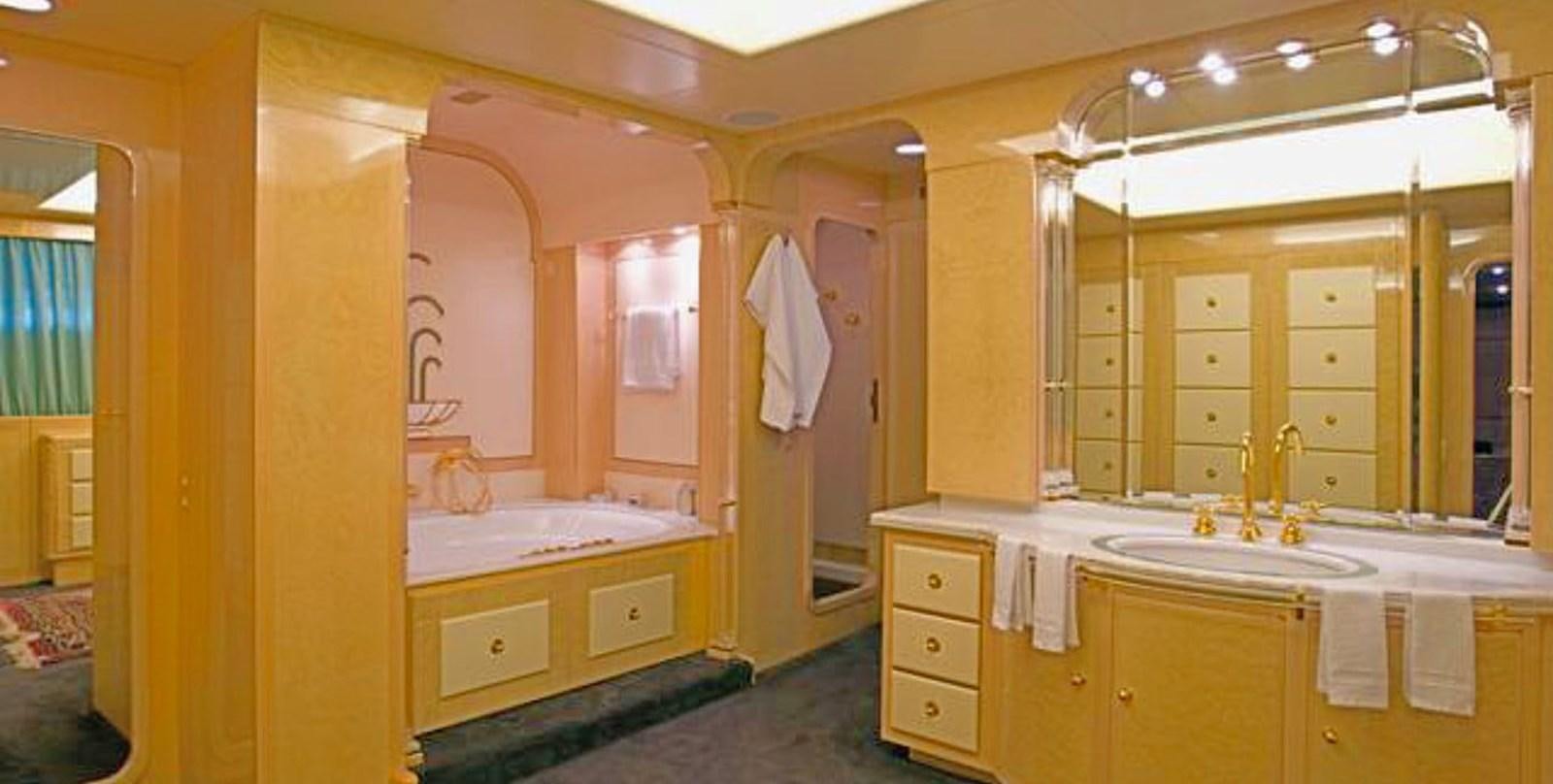a bathroom with a large mirror aboard ADAMAS V Yacht for Sale