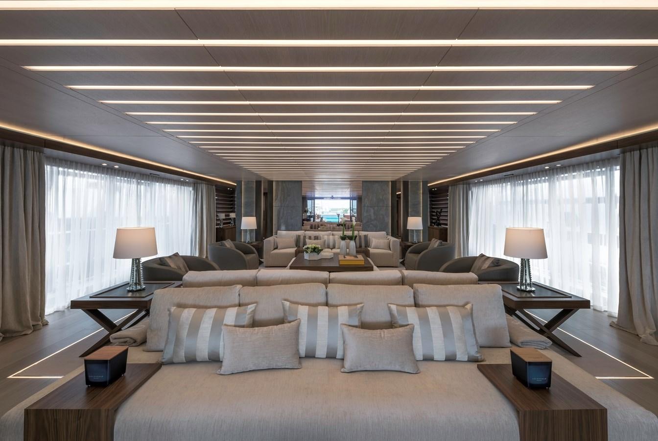 a large white bed with pillows aboard UTOPIA IV Yacht for Sale