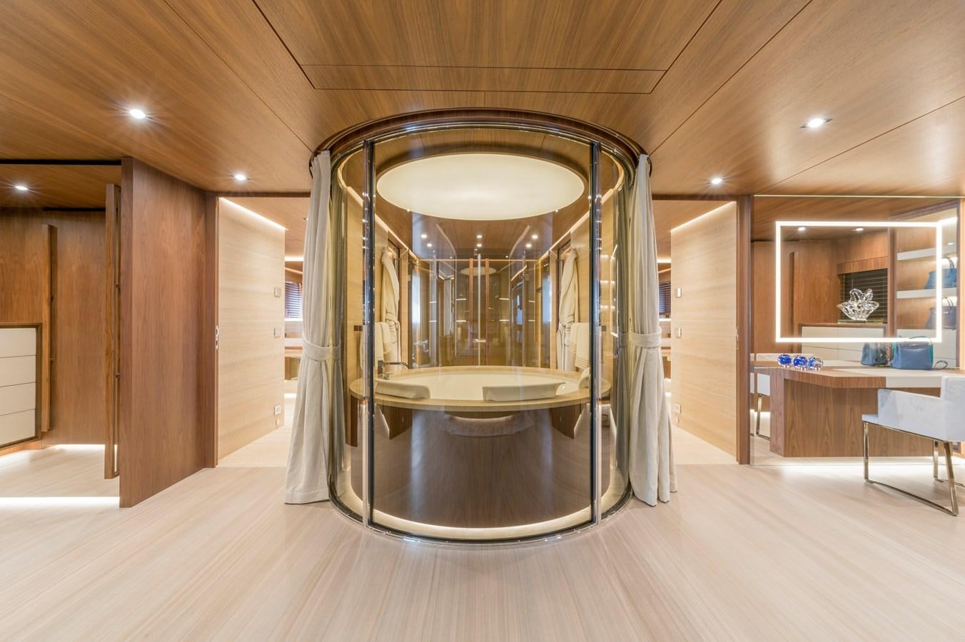 a large mirror in a room aboard UTOPIA IV Yacht for Sale