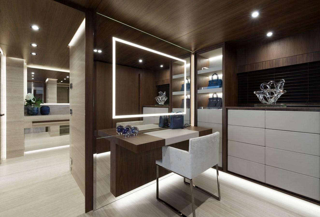 a room with a desk and a chair aboard UTOPIA IV Yacht for Sale