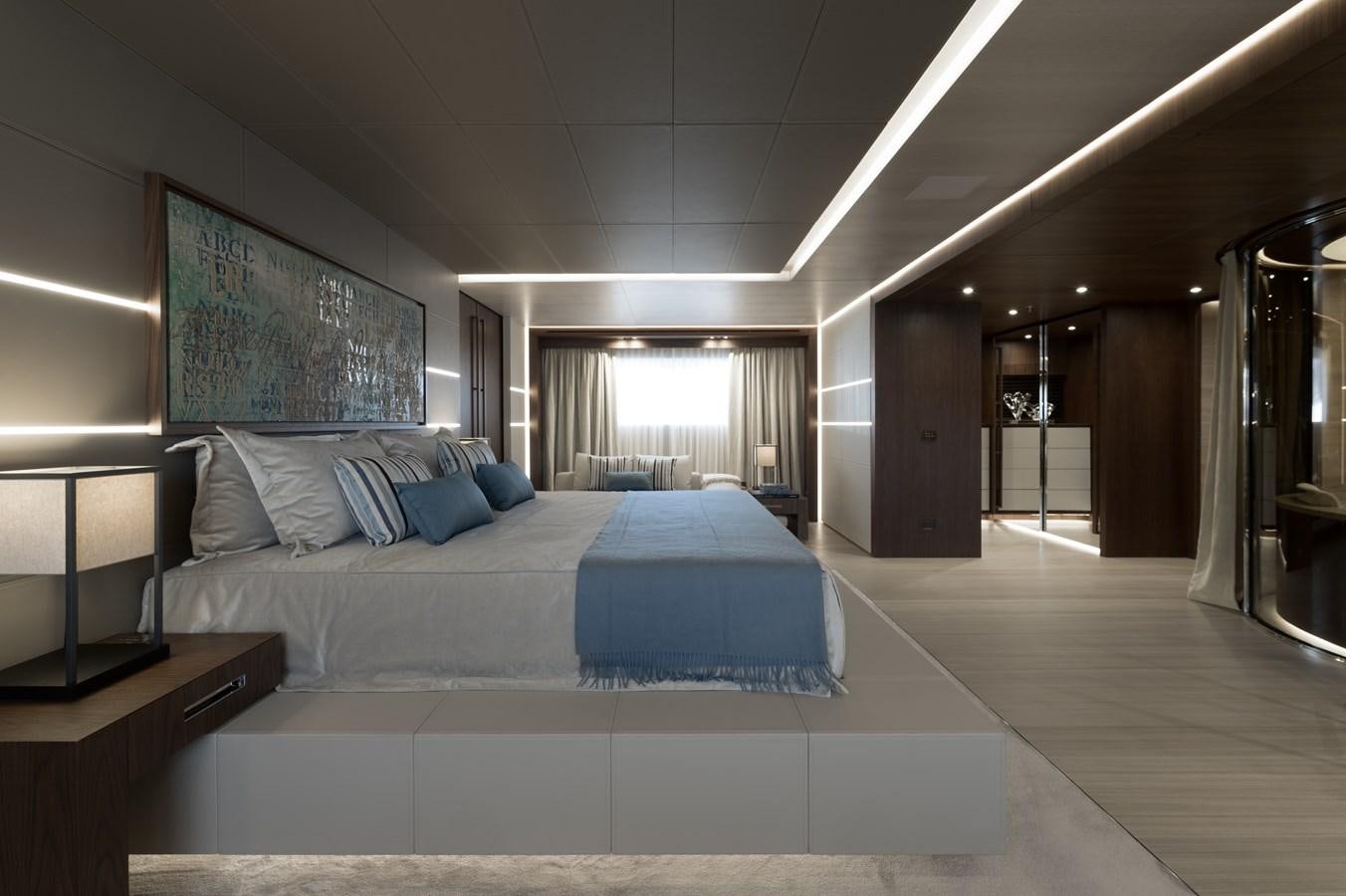 a large bedroom with a large bed aboard UTOPIA IV Yacht for Sale
