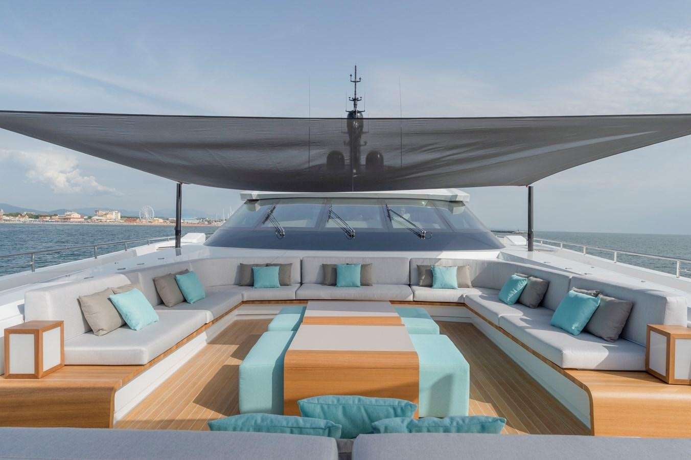a large open living room with a large open roof aboard UTOPIA IV Yacht for Sale