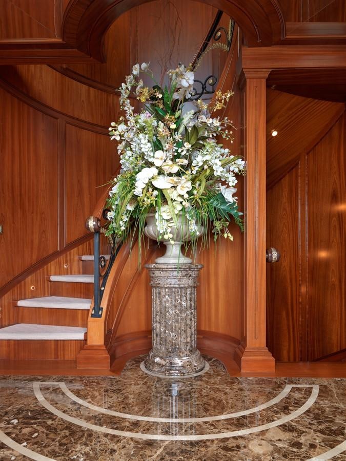 a vase with white flowers aboard APOGEE Yacht for Sale