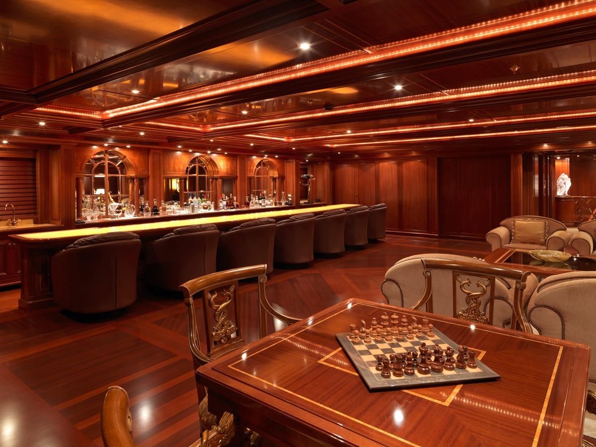 a bar with a bar and a bar aboard APOGEE Yacht for Sale