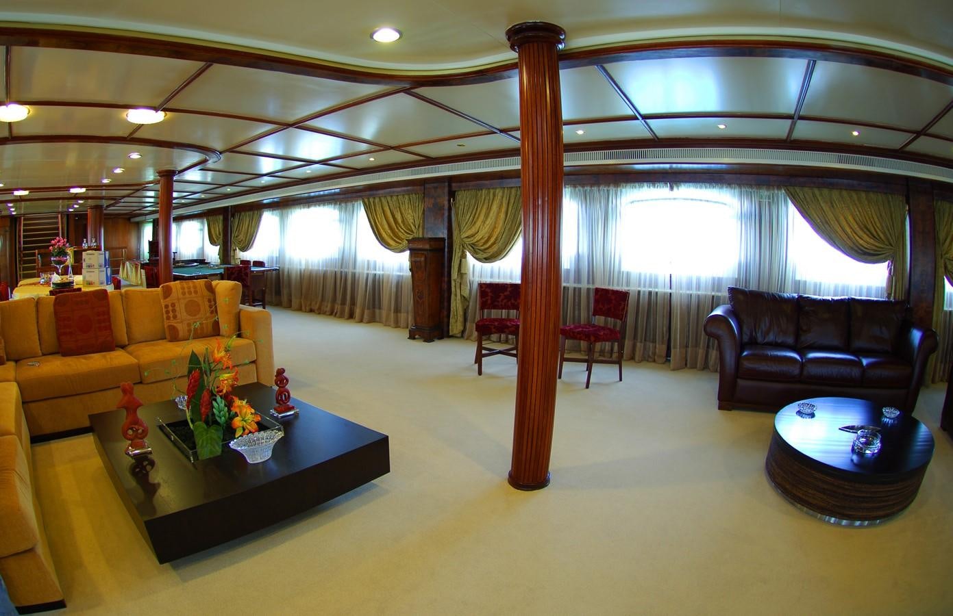 a large room with couches and a table aboard BLUE DAWN Yacht for Sale