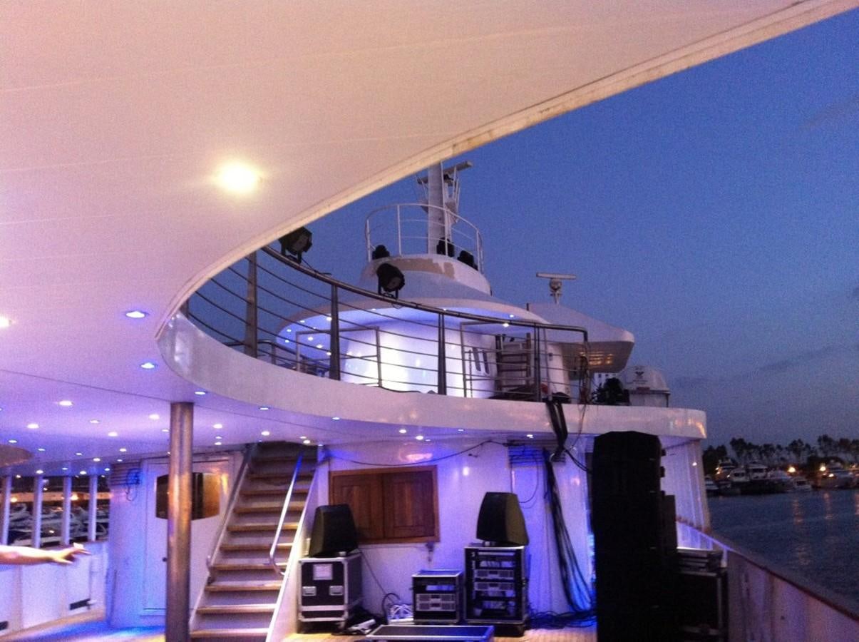 a large white ship docked aboard BLUE DAWN Yacht for Sale