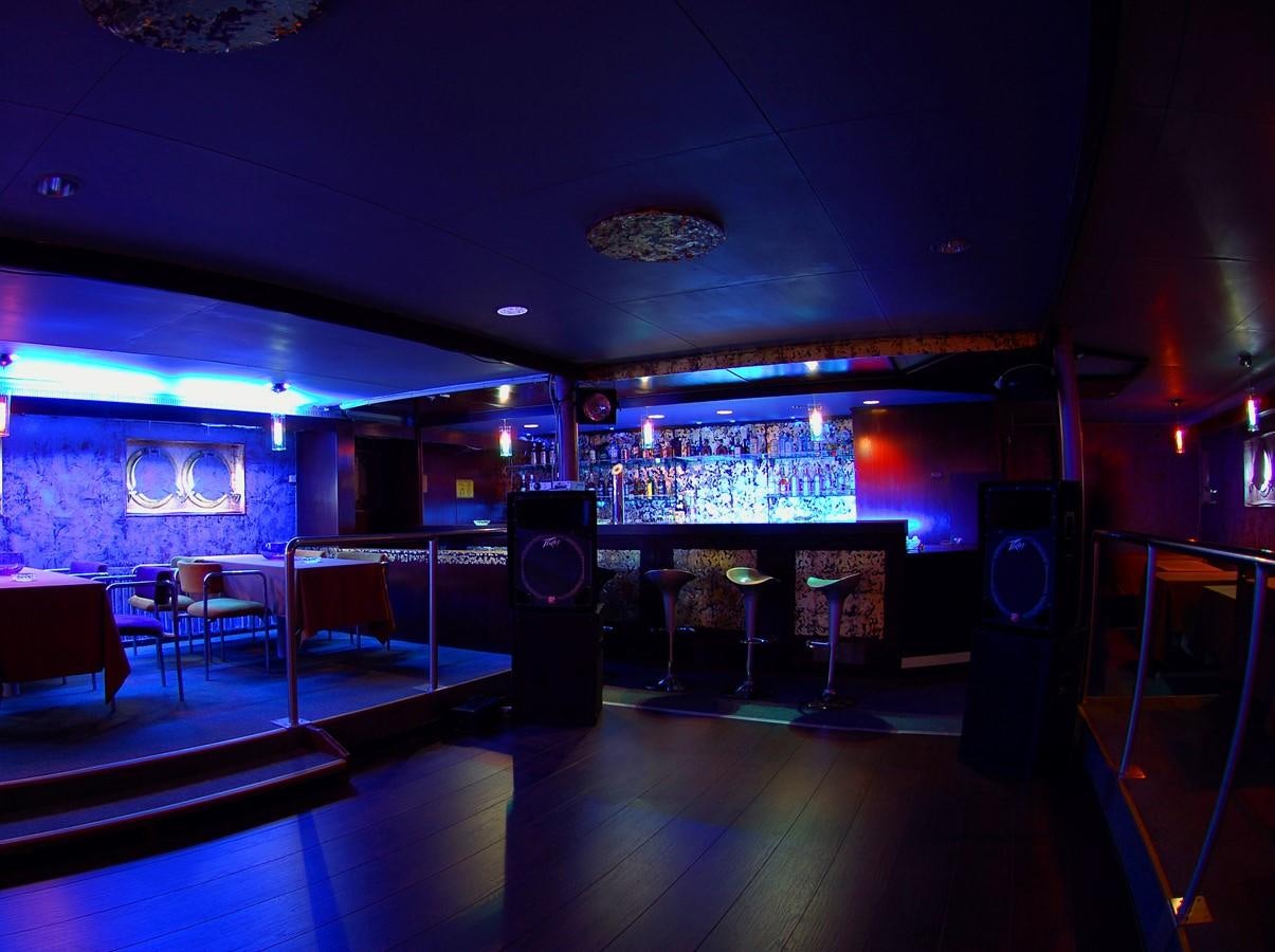 a stage with speakers and a screen aboard BLUE DAWN Yacht for Sale