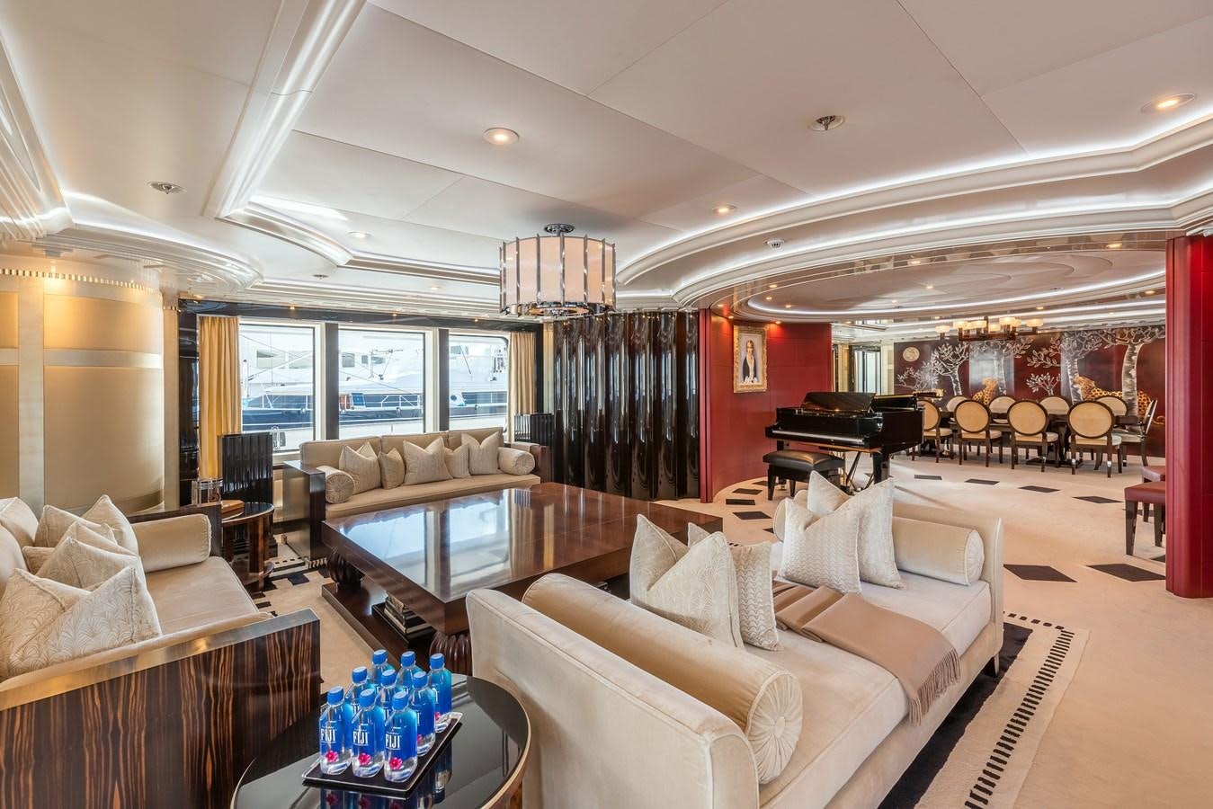a living room with a large window aboard MARGUERITE Yacht for Sale