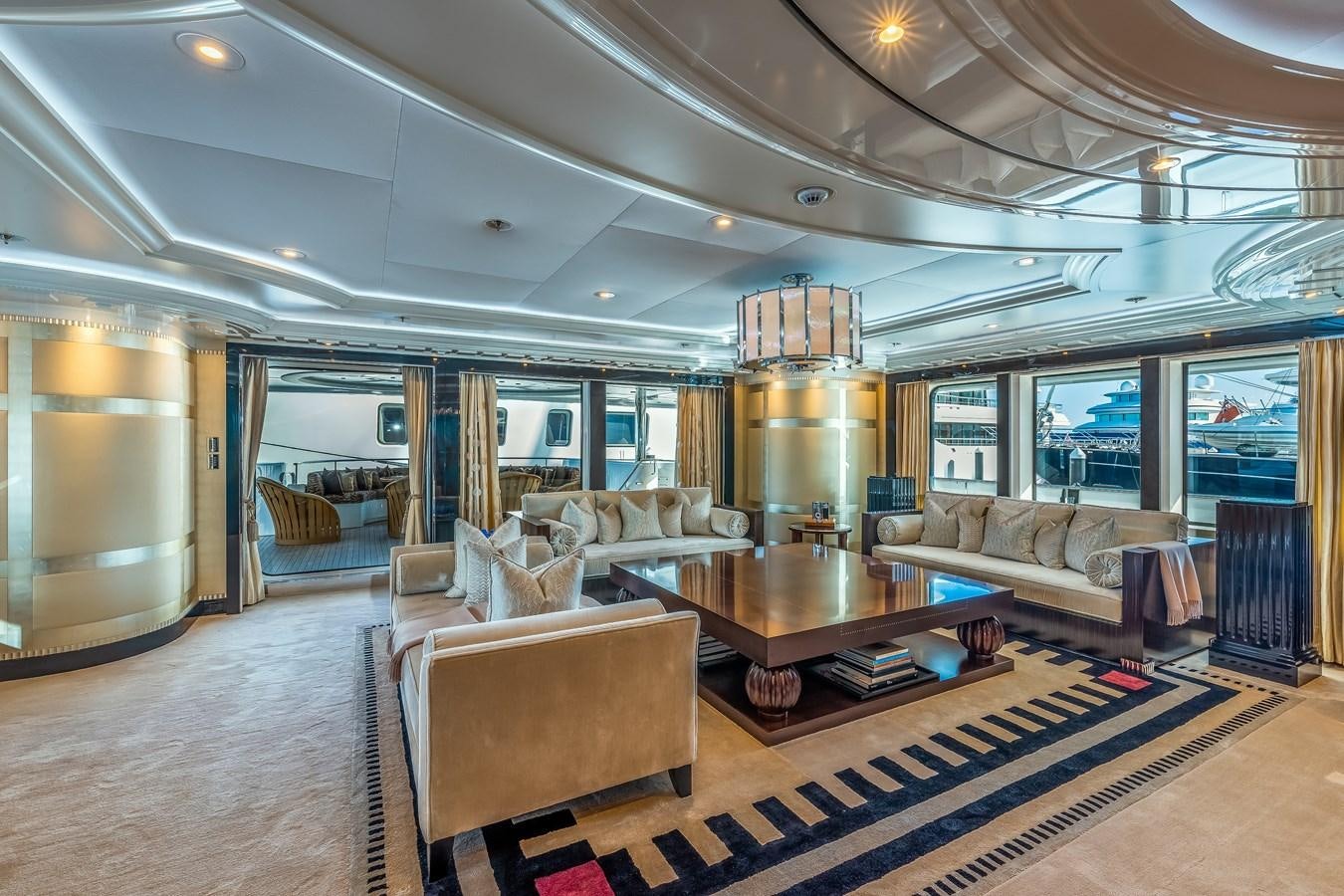 a living room with a large window aboard MARGUERITE Yacht for Sale