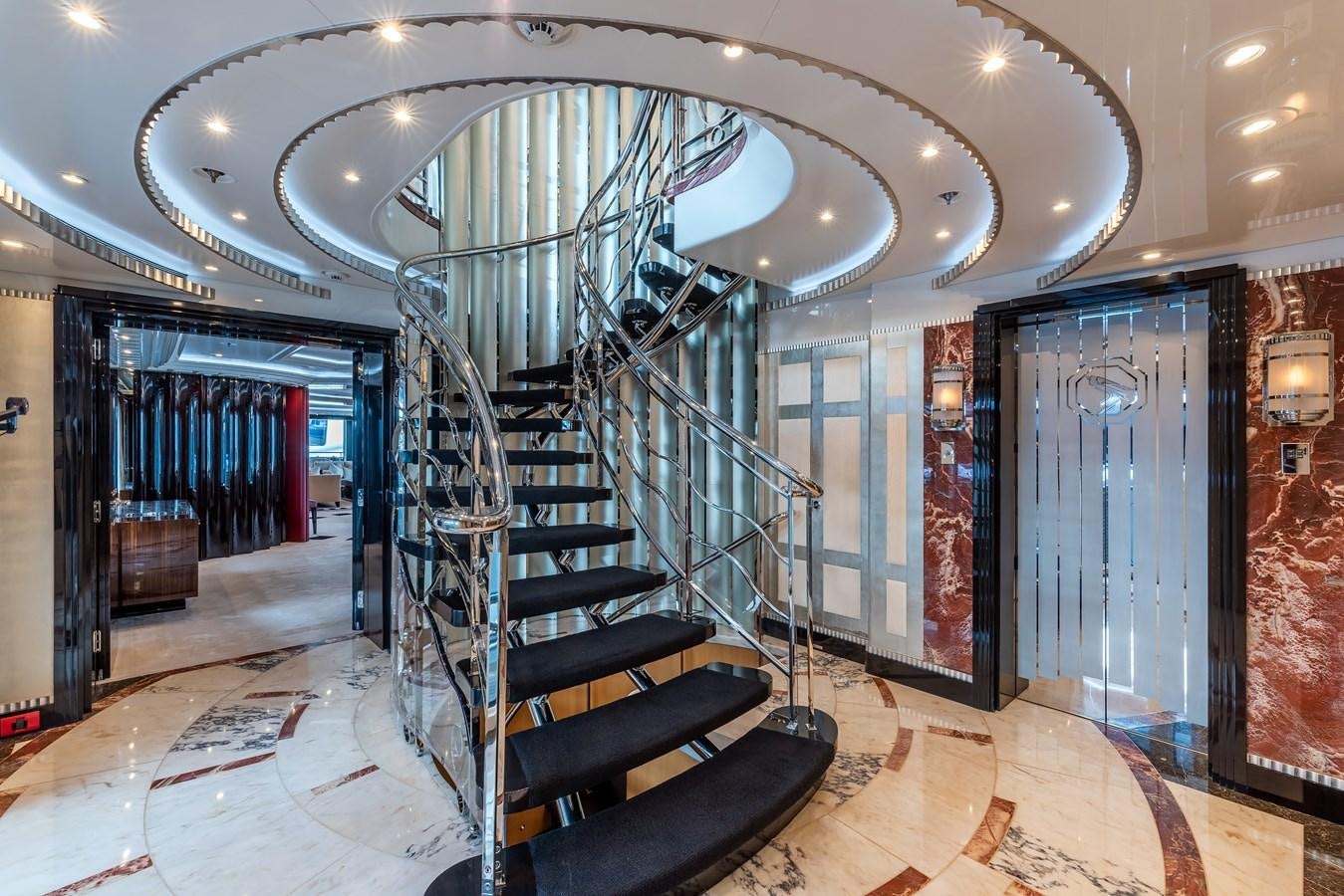 a large staircase in a building aboard MARGUERITE Yacht for Sale