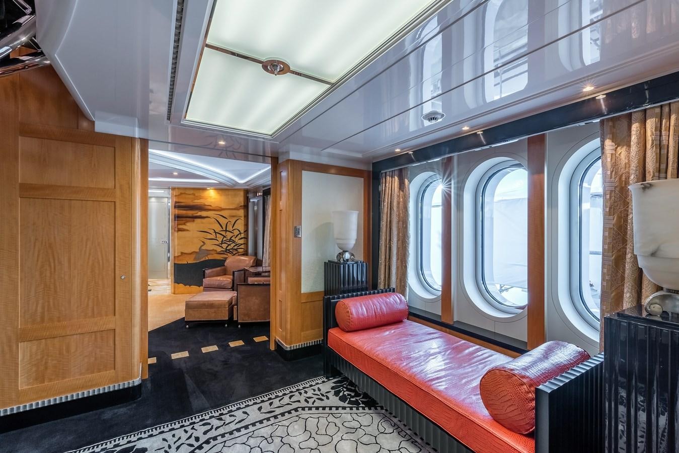 a room with a bed and a couch aboard MARGUERITE Yacht for Sale
