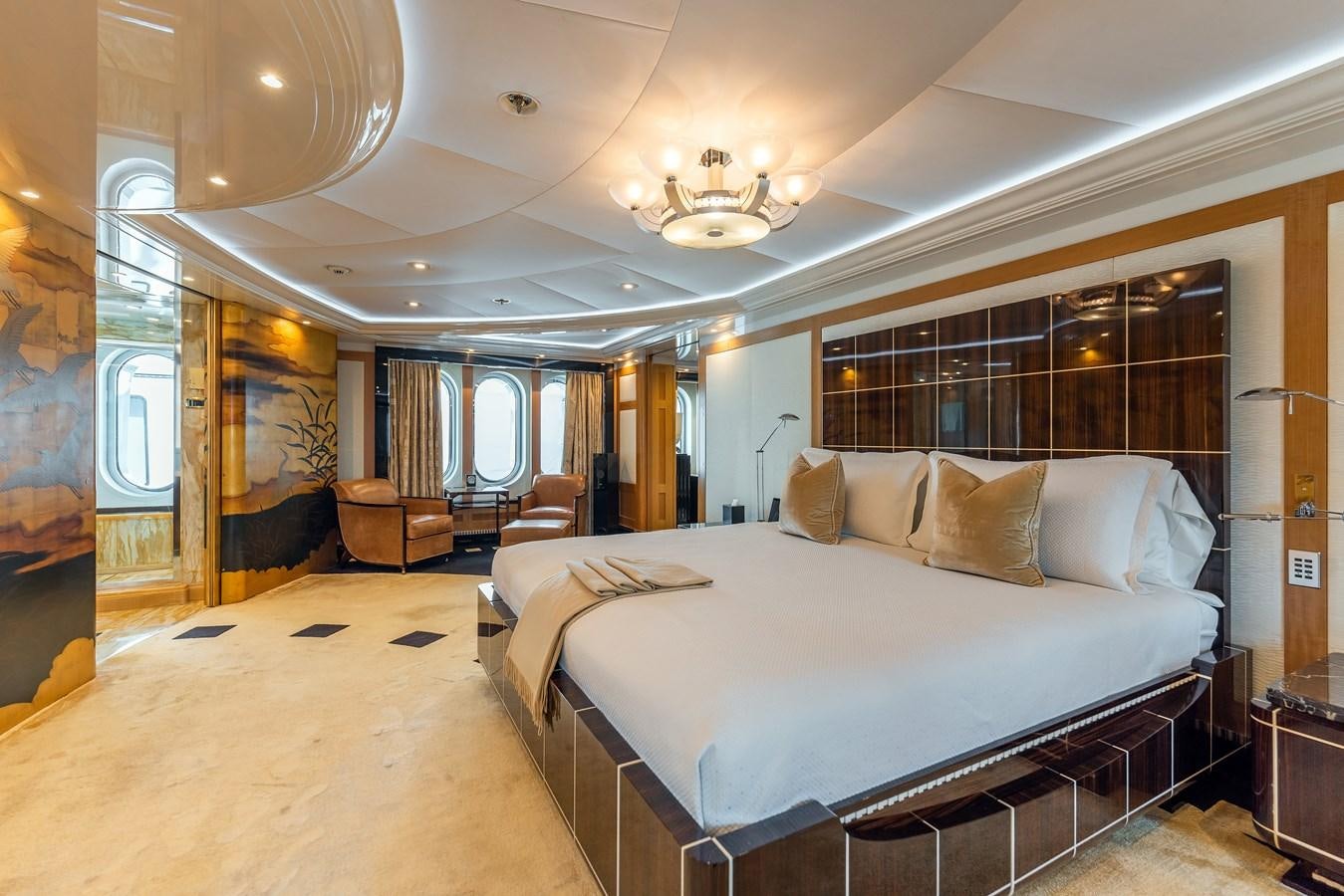 a large bedroom with a large bed aboard MARGUERITE Yacht for Sale