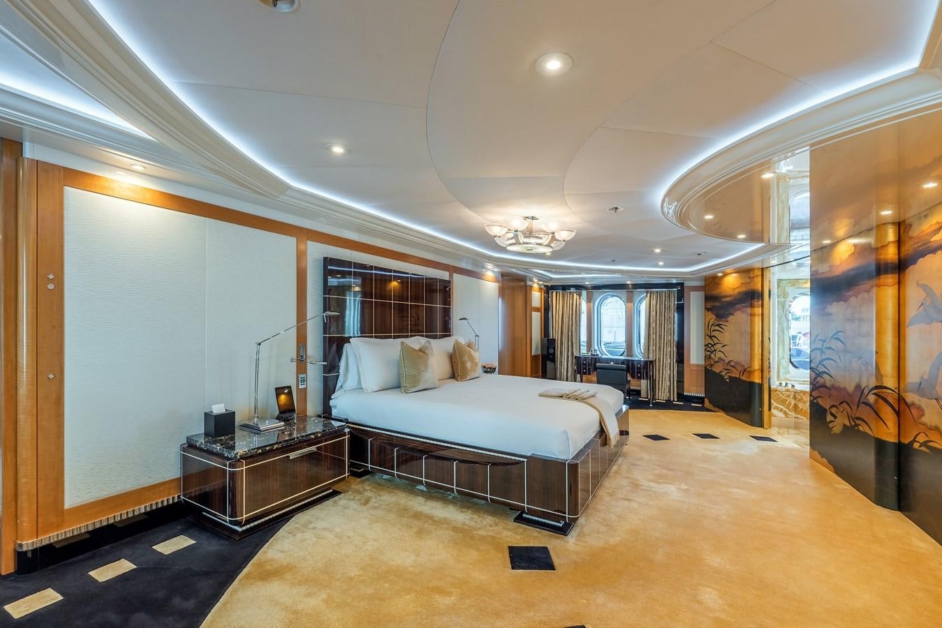 a large bedroom with a large bed aboard MARGUERITE Yacht for Sale