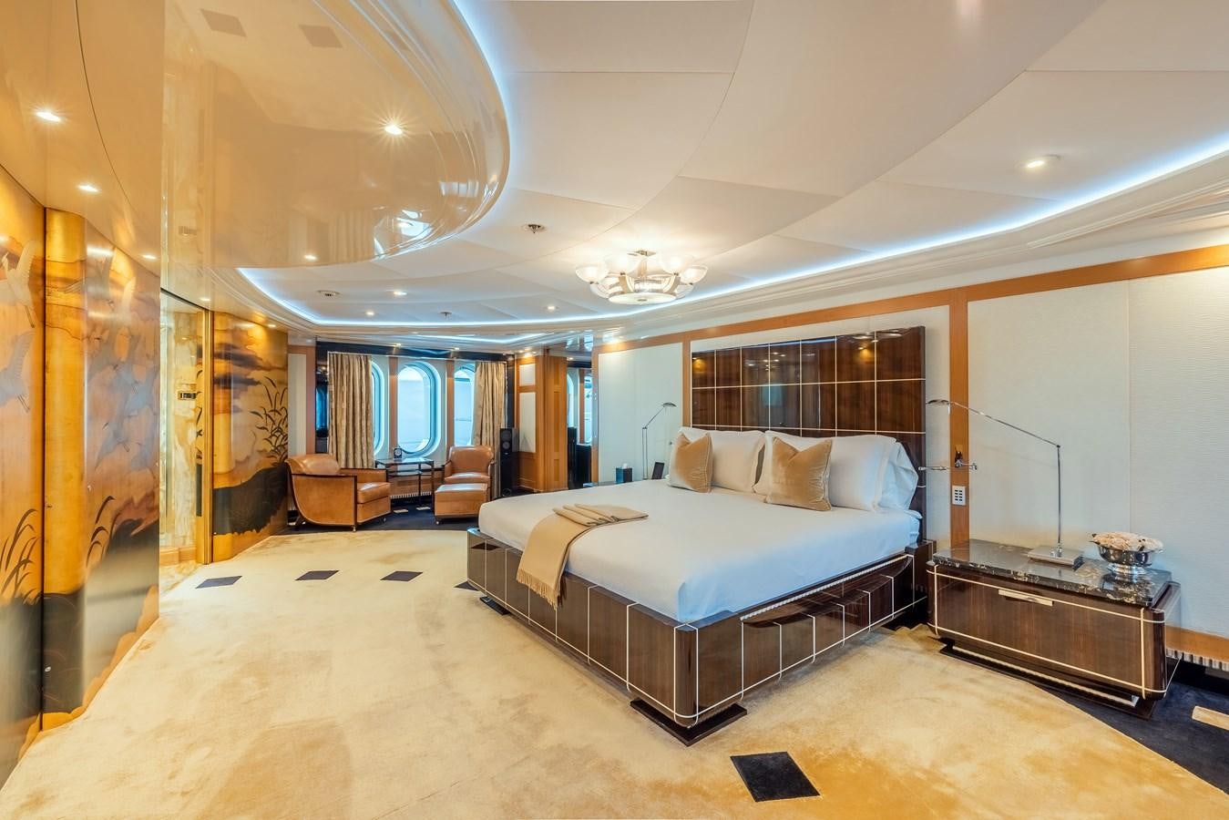a large bedroom with a large bed aboard MARGUERITE Yacht for Sale