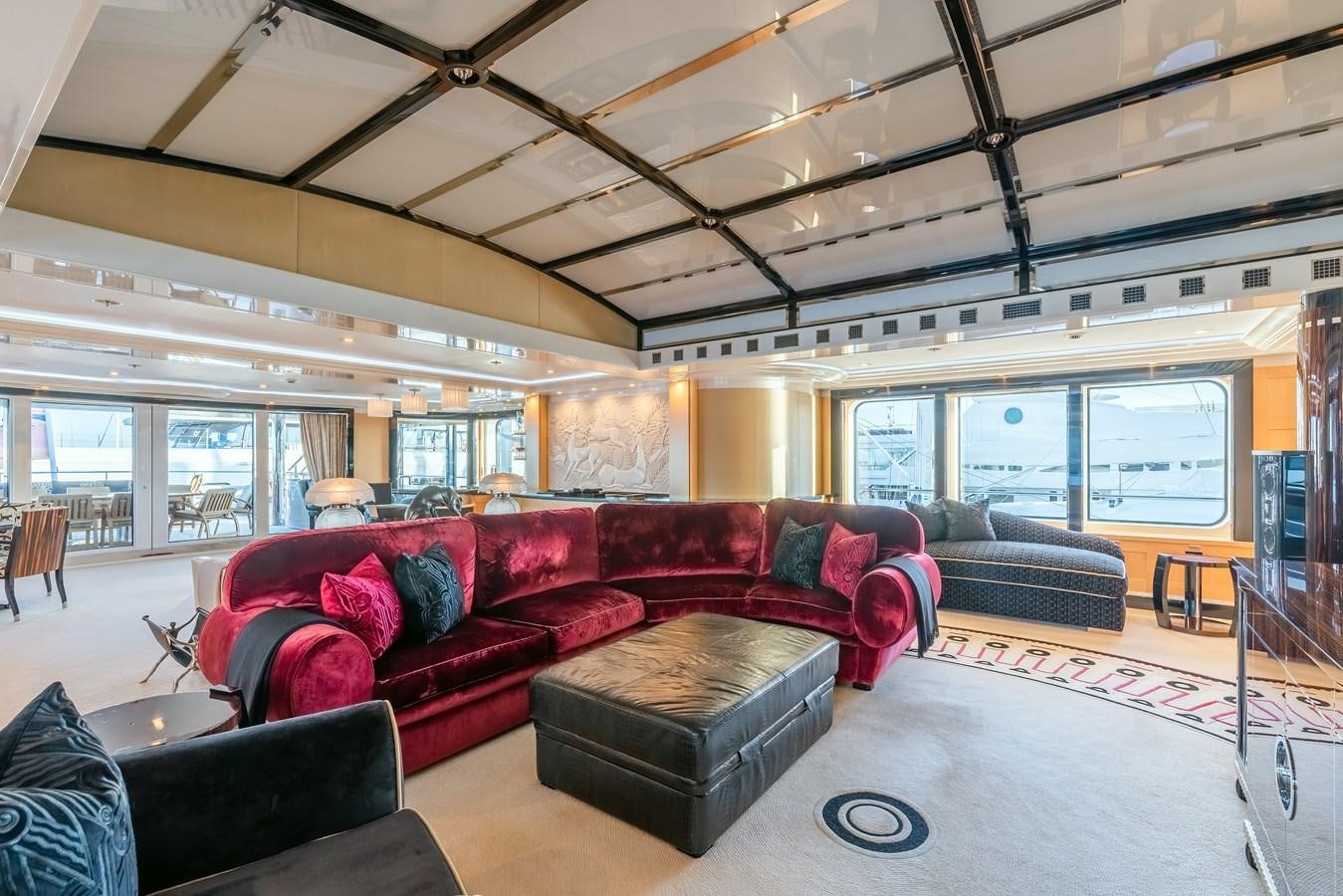 a living room with leather couches aboard MARGUERITE Yacht for Sale