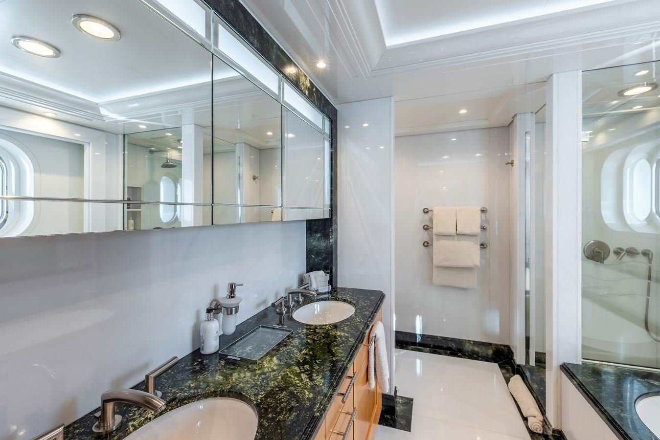 a bathroom with a marble countertop aboard MARGUERITE Yacht for Sale
