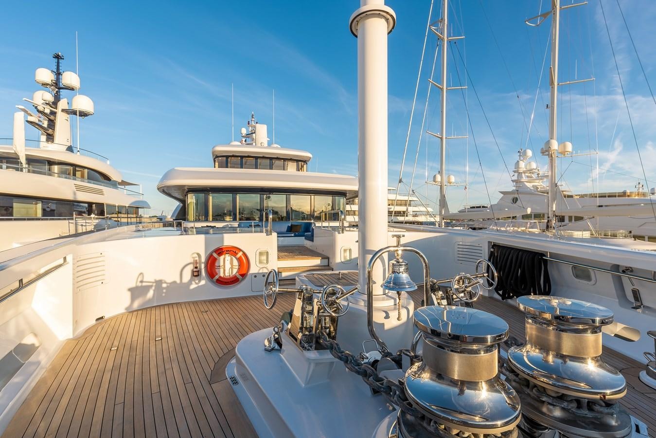 a large ship docked at a pier aboard MARGUERITE Yacht for Sale