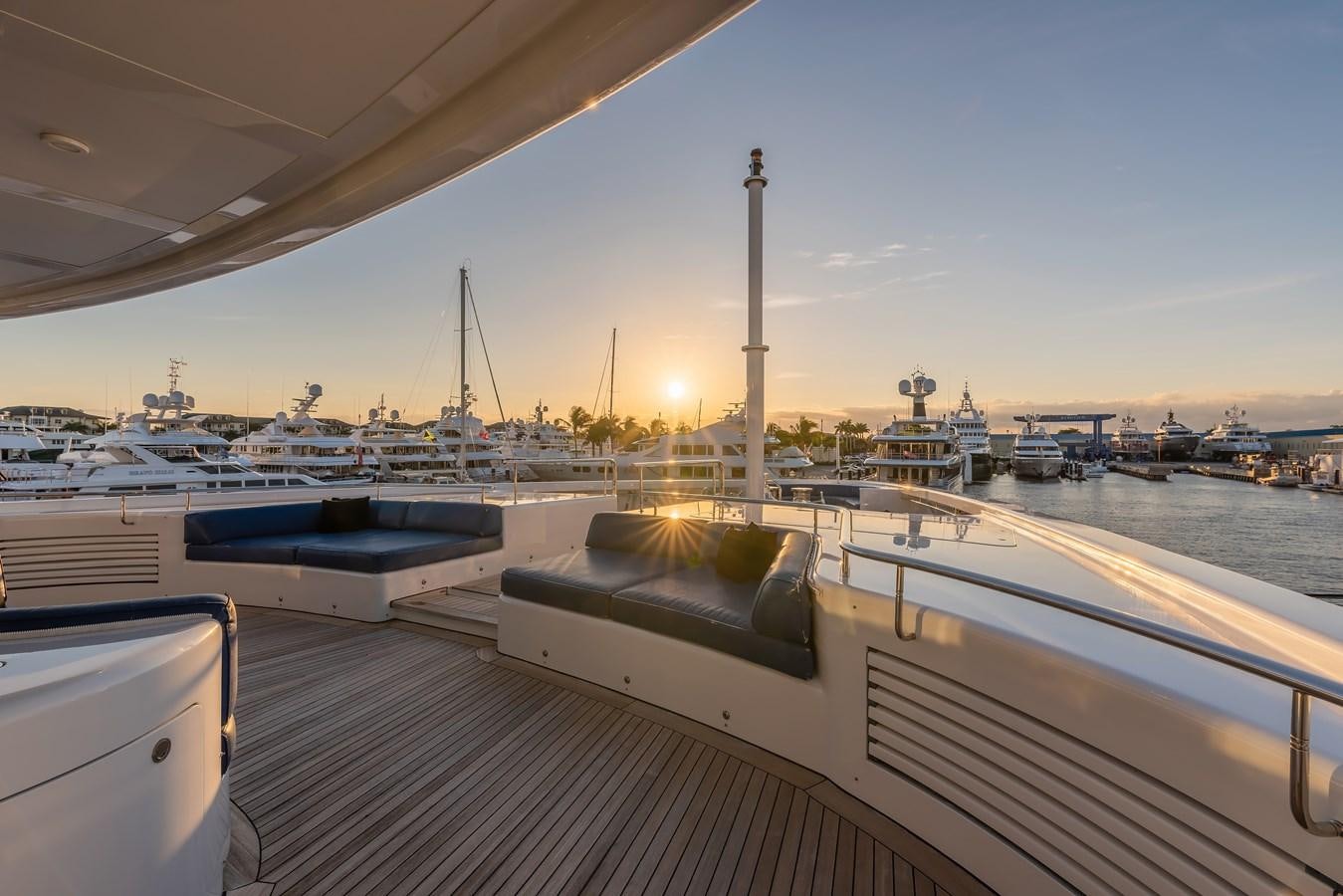a boat dock with boats aboard MARGUERITE Yacht for Sale