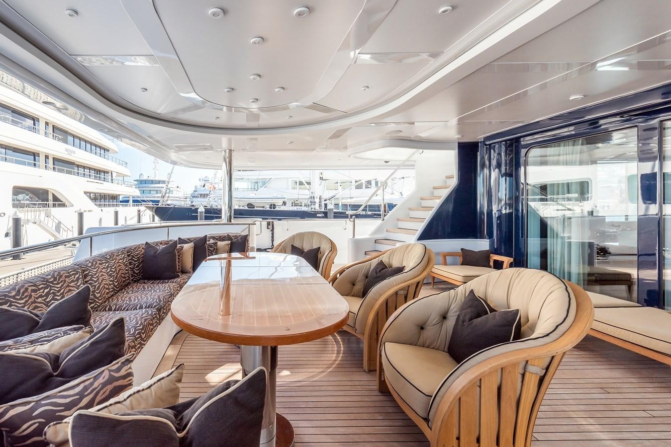 a living room with a large window aboard MARGUERITE Yacht for Sale