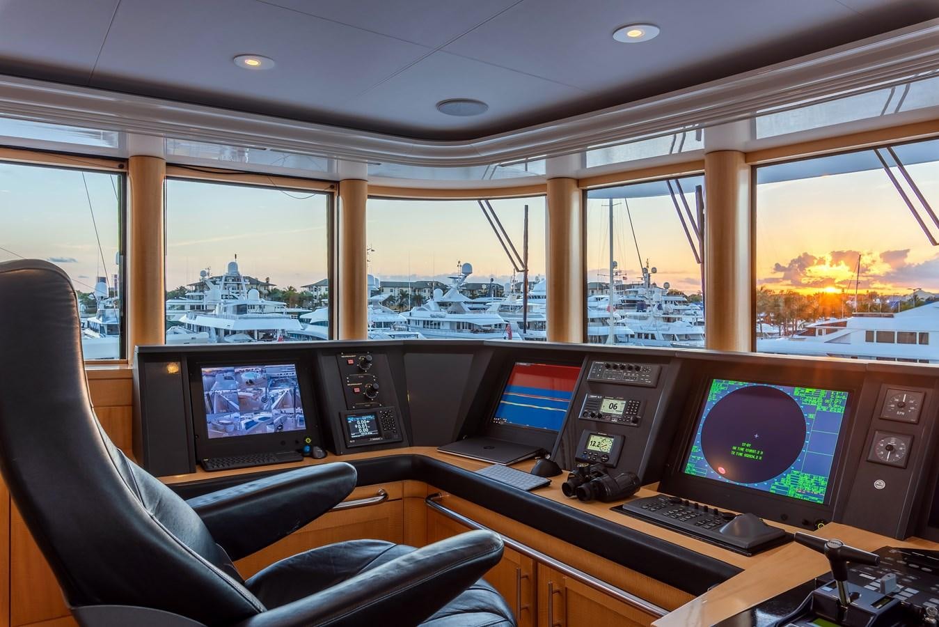 a room with many monitors and windows aboard MARGUERITE Yacht for Sale