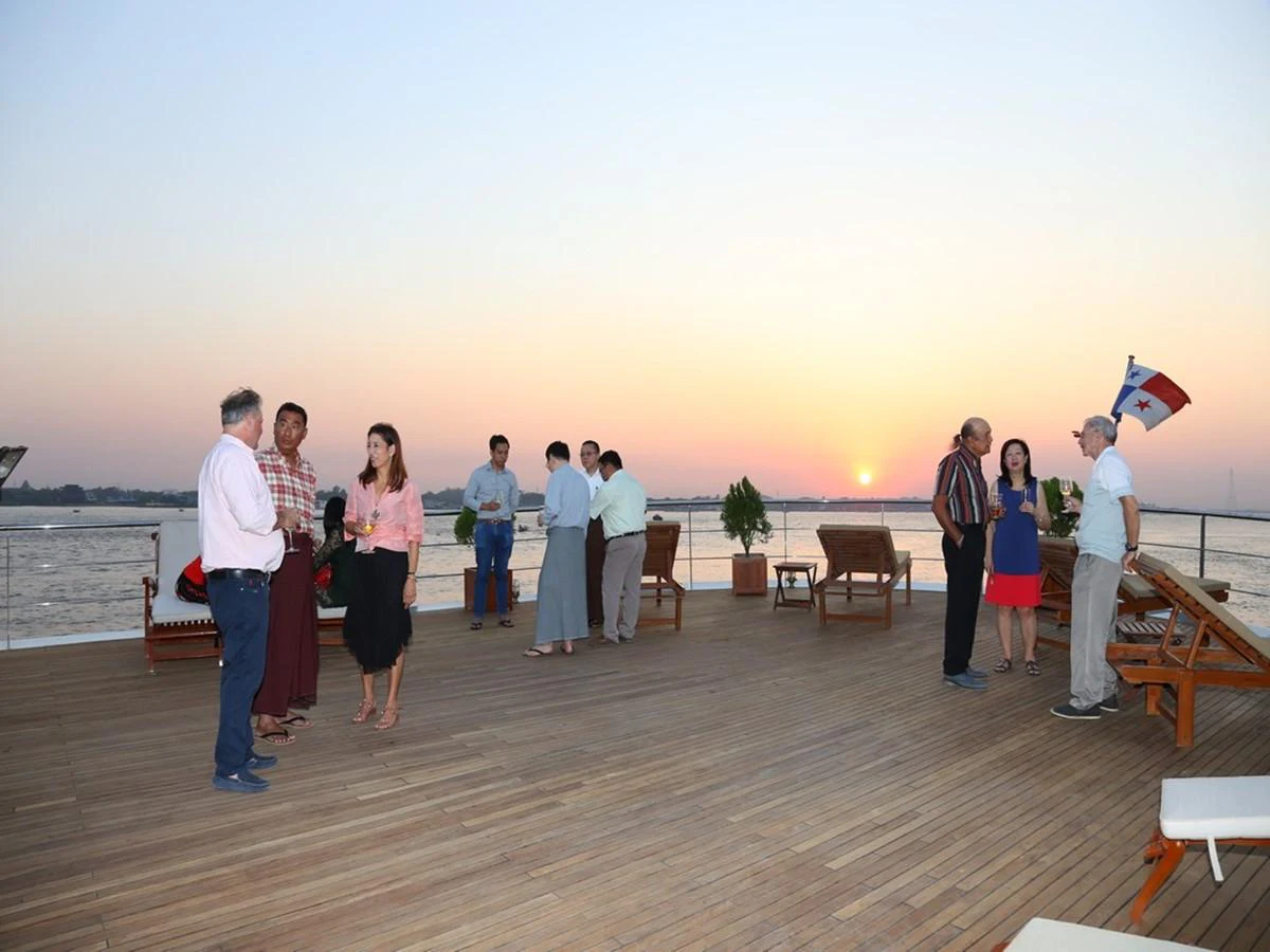 a group of people standing on a dock aboard ANDAMAN EXPLORER Yacht for Sale
