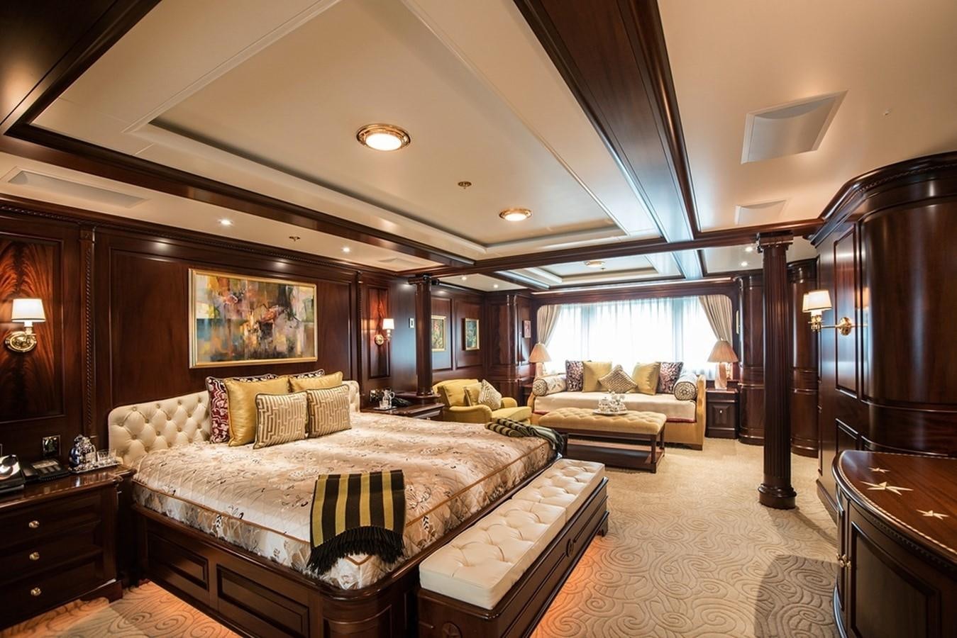 a large bedroom with a large bed aboard PARAFFIN Yacht for Sale
