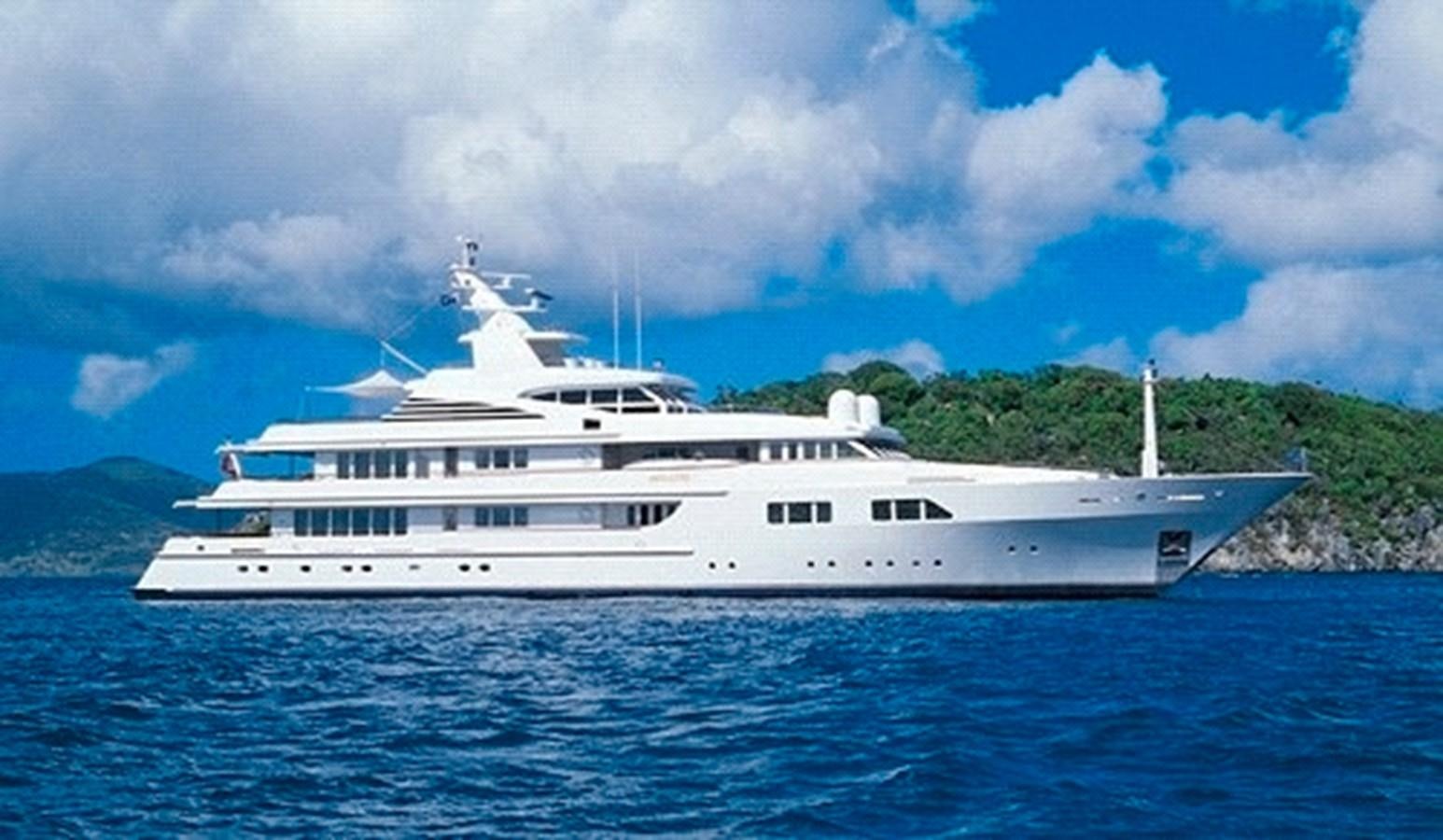 a white boat in the water aboard PARAFFIN Yacht for Sale