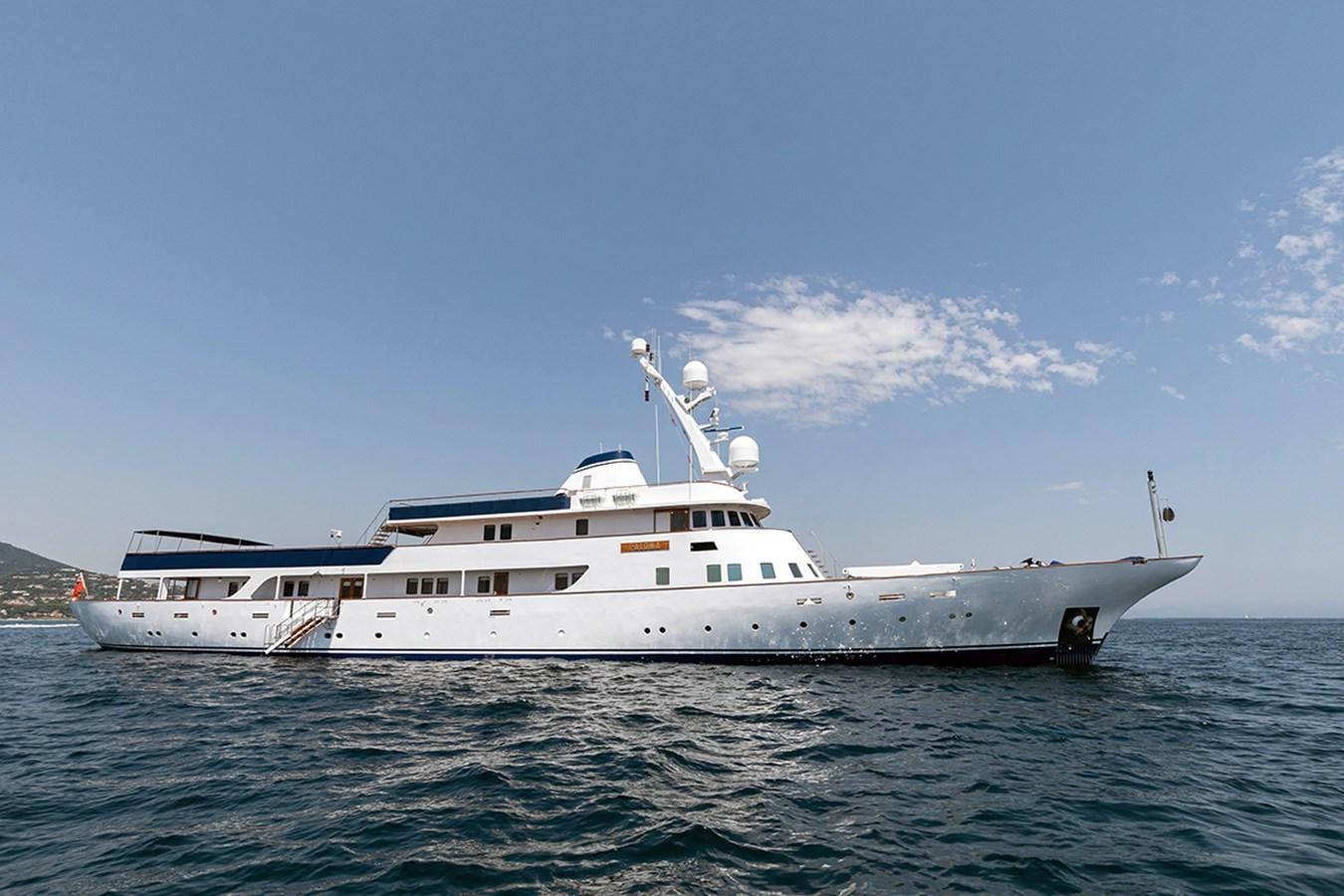 a white boat in the water aboard PALOMA Yacht for Sale