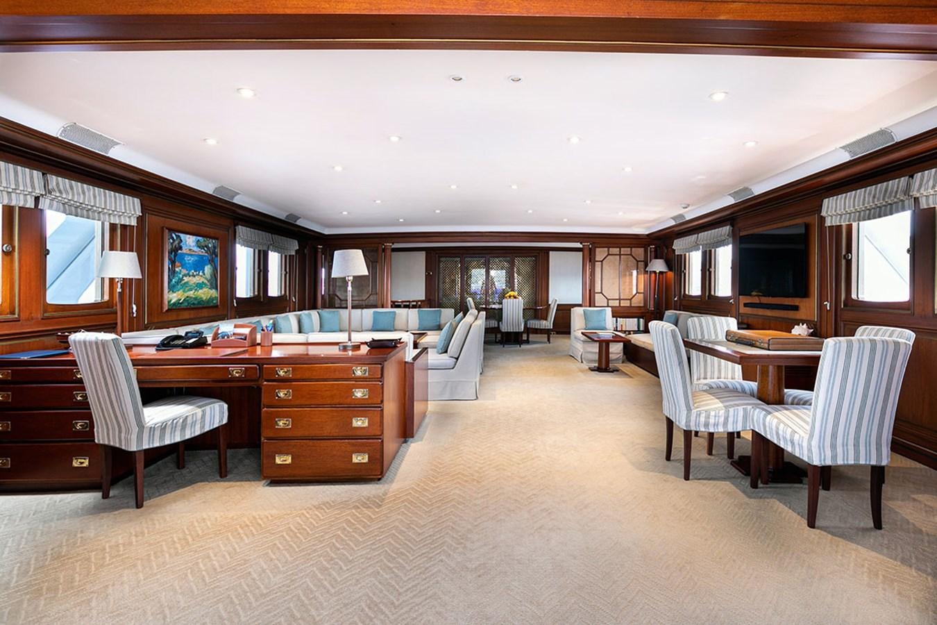 a large living room with a large open floor plan aboard PALOMA Yacht for Sale
