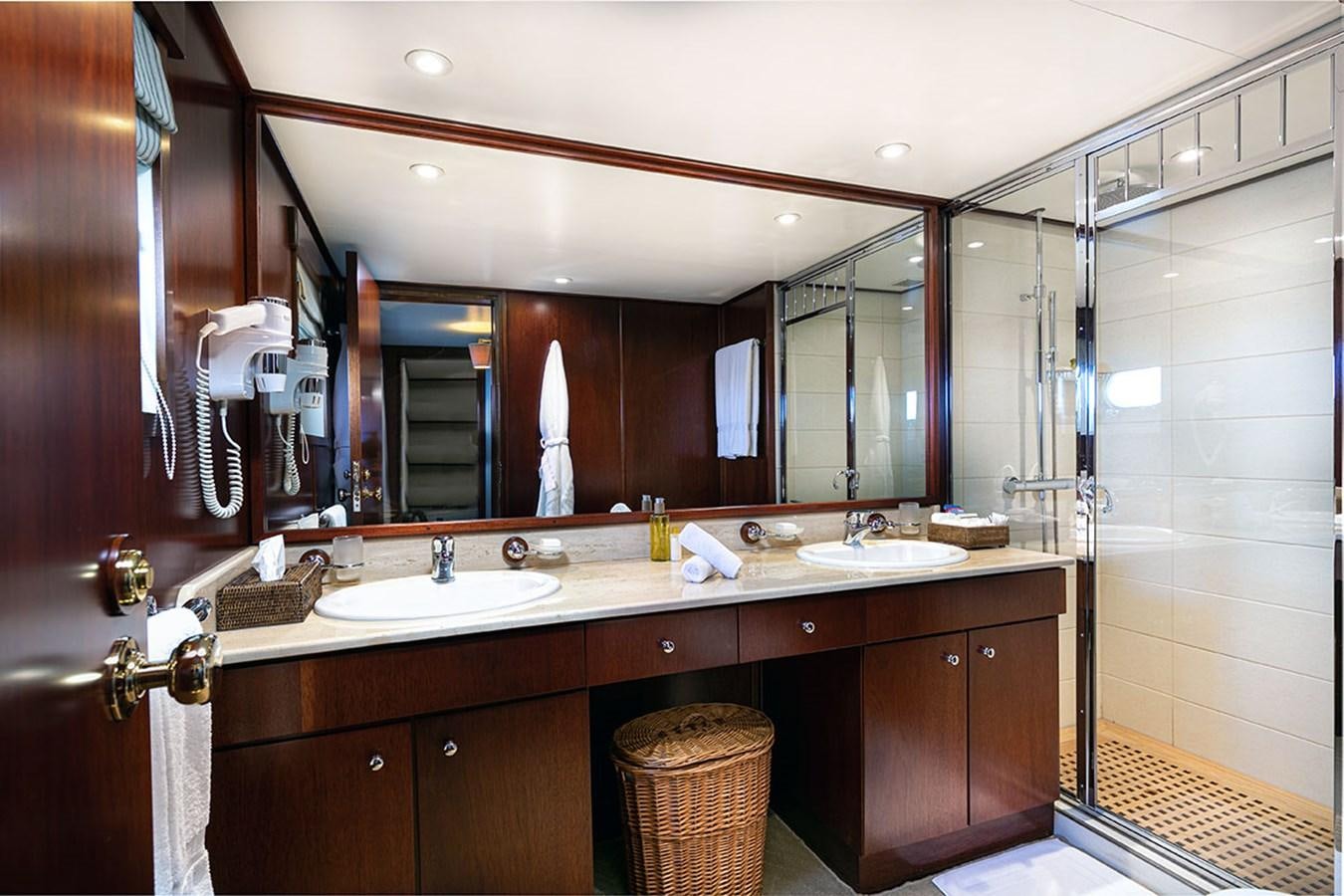 a bathroom with a large mirror aboard PALOMA Yacht for Sale