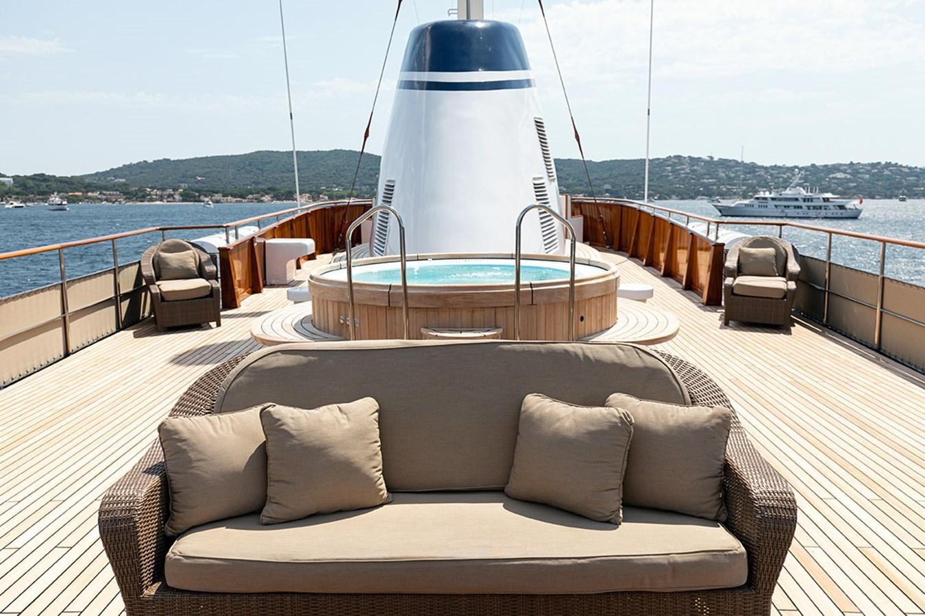 a boat on a deck aboard PALOMA Yacht for Sale