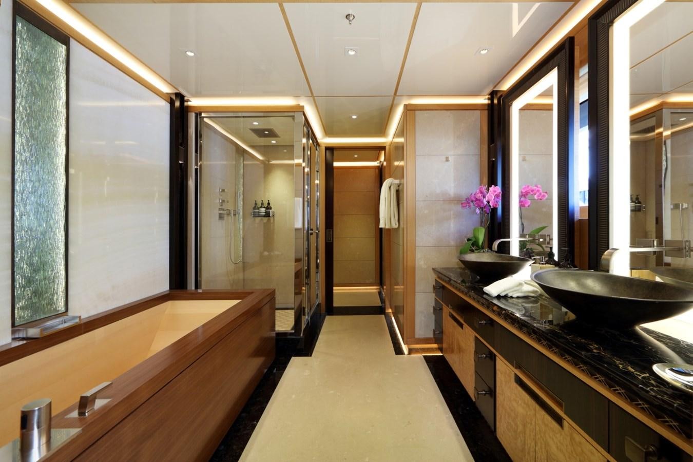 a bathroom with a large glass shower aboard FORMOSA Yacht for Sale