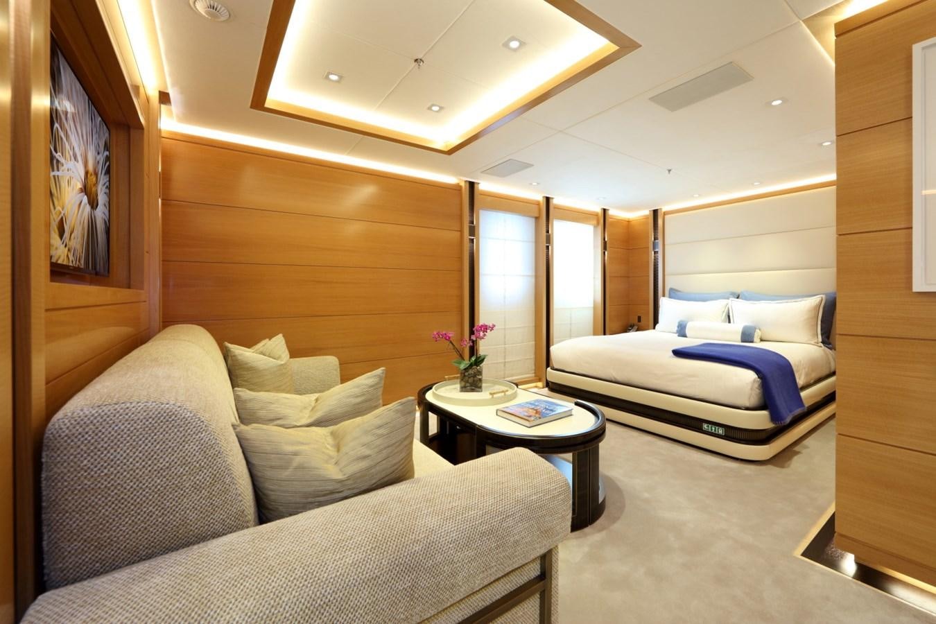 a room with a bed and a table aboard FORMOSA Yacht for Sale