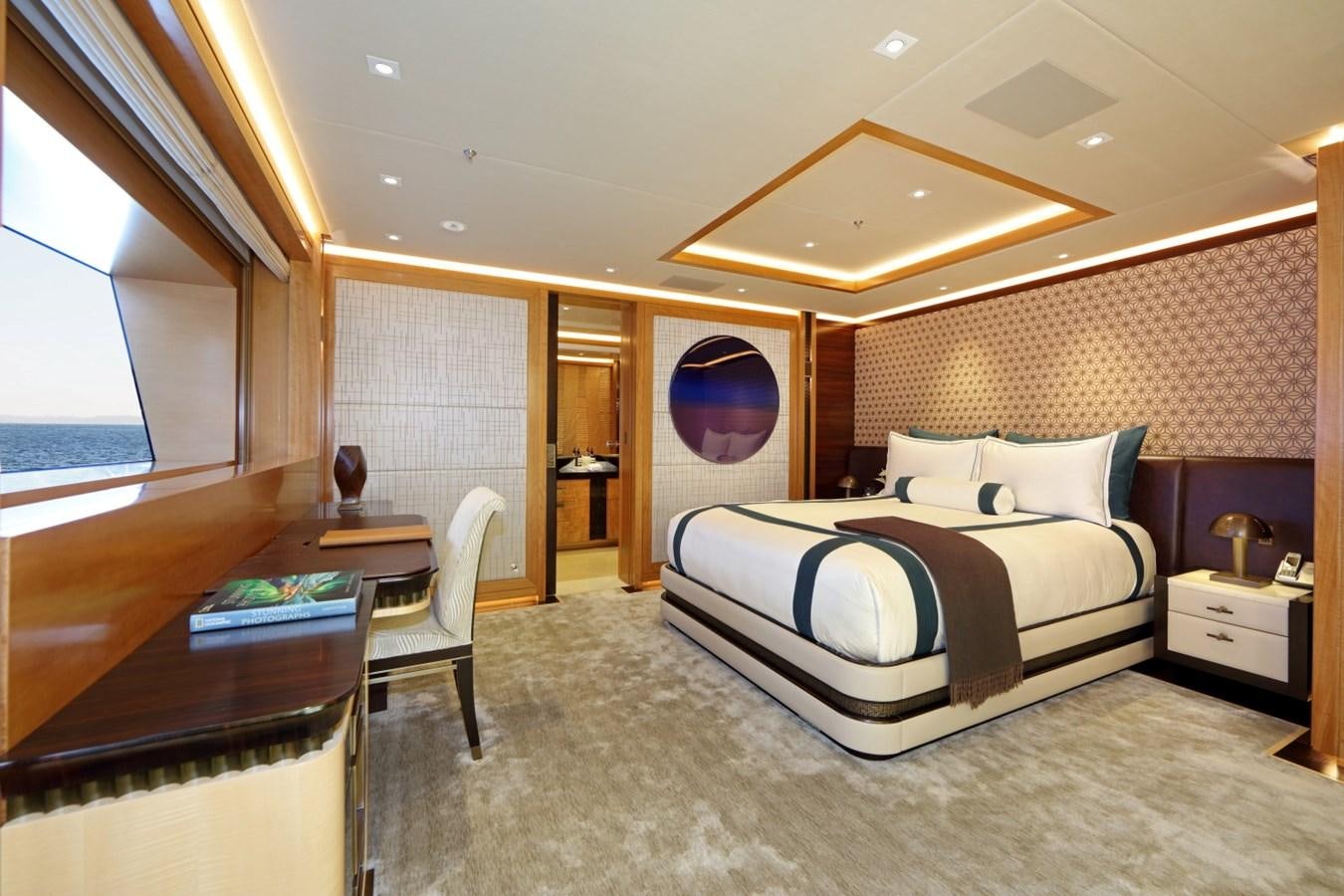 a bedroom with a large bed aboard FORMOSA Yacht for Sale