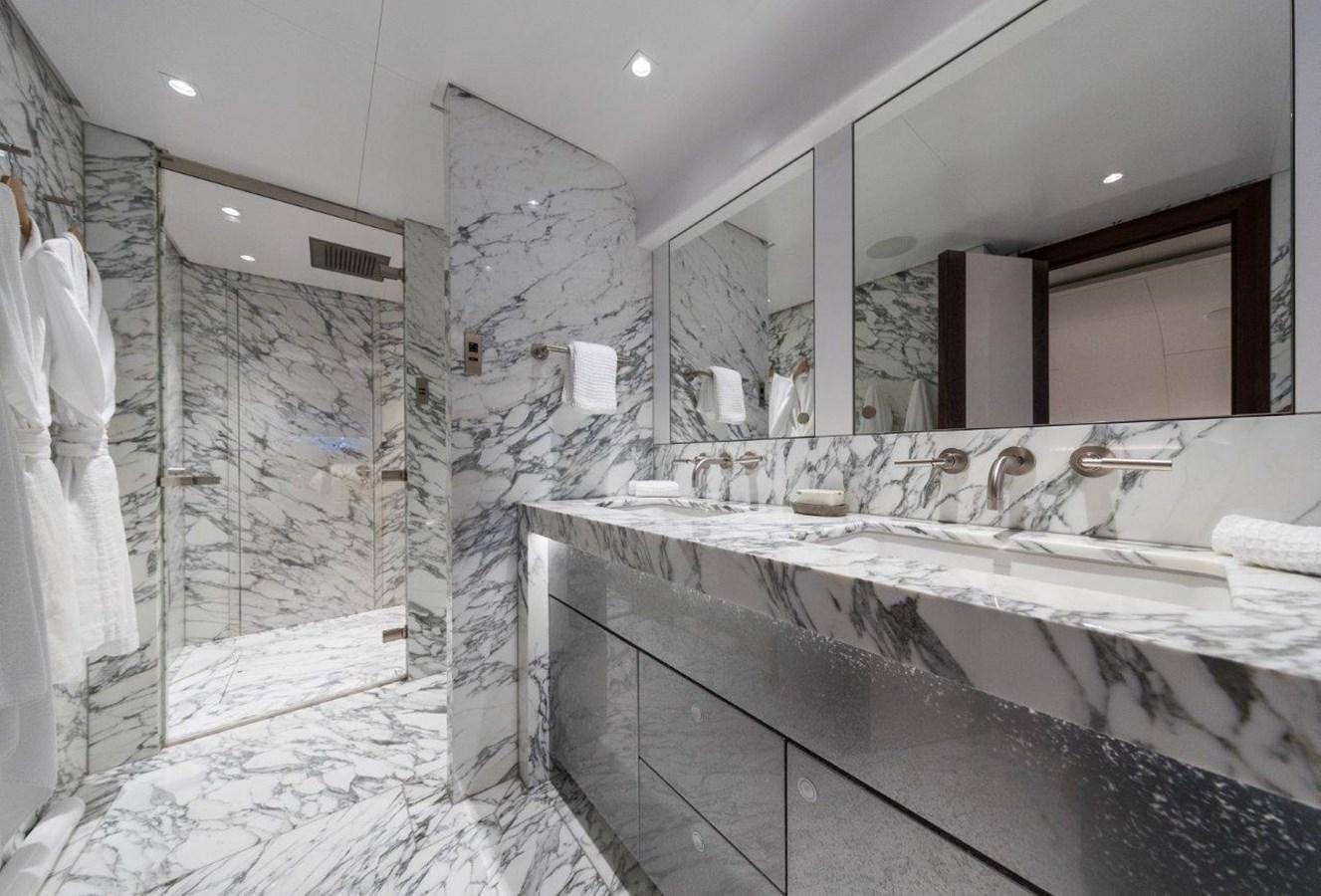 a bathroom with a large mirror aboard NGONI Yacht for Sale