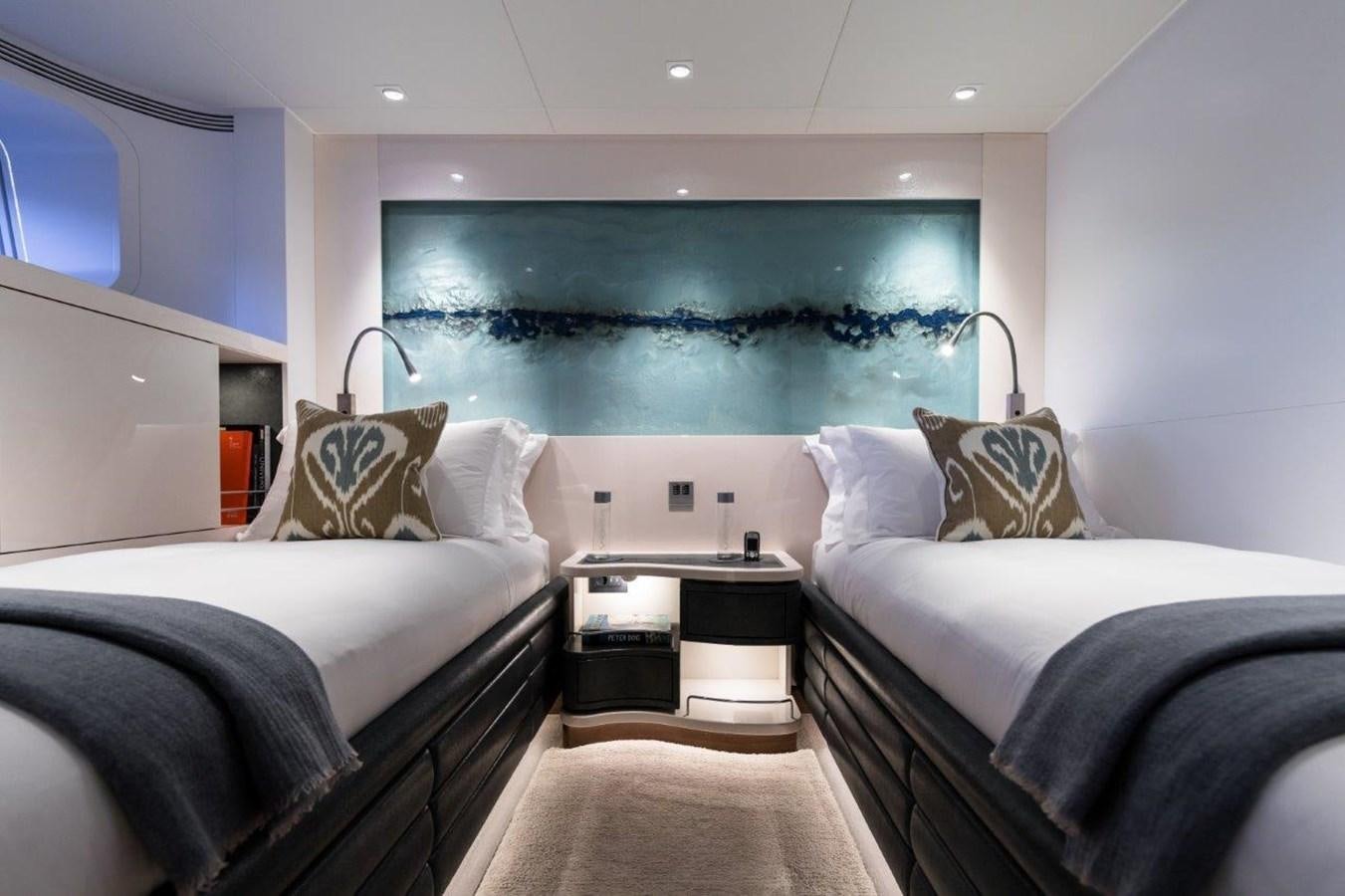 a room with two beds aboard NGONI Yacht for Sale