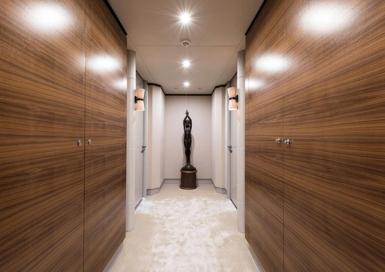 a hallway with wood doors aboard LADY A Yacht for Sale